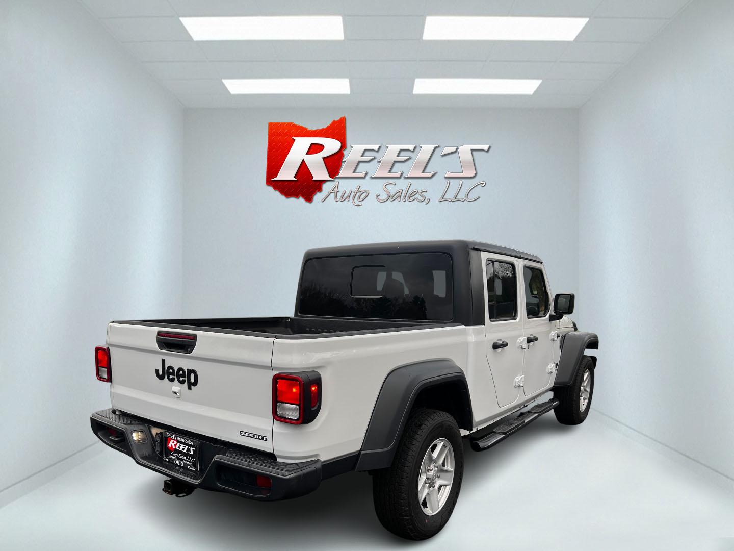 2020 White /Black Jeep Gladiator Sport S (1C6HJTAGXLL) with an 3.6L V6 DOHC 24V engine, 8-Speed Automatic transmission, located at 11115 Chardon Rd. , Chardon, OH, 44024, (440) 214-9705, 41.580246, -81.241943 - This 2020 Jeep Gladiator Sport S is a versatile midsize pickup renowned for its robust capabilities and modern features. Powered by a 3.6L Pentastar V6 engine paired with an 8-speed automatic transmission, it delivers a solid highway mileage of 22 MPG. Noteworthy features include a 7.0" touchscreen - Photo#5