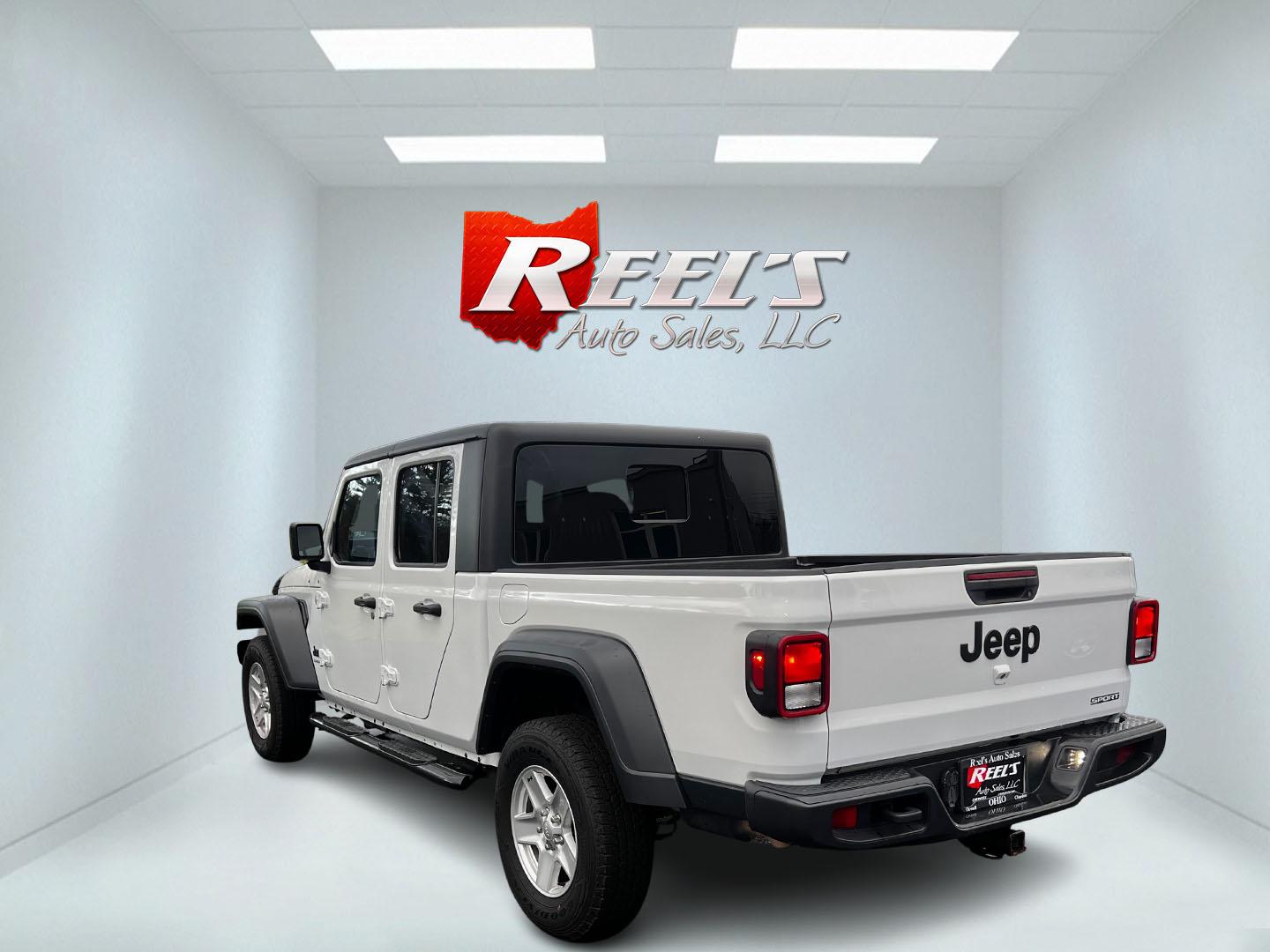 2020 White /Black Jeep Gladiator Sport S (1C6HJTAGXLL) with an 3.6L V6 DOHC 24V engine, 8-Speed Automatic transmission, located at 11115 Chardon Rd. , Chardon, OH, 44024, (440) 214-9705, 41.580246, -81.241943 - This 2020 Jeep Gladiator Sport S is a versatile midsize pickup renowned for its robust capabilities and modern features. Powered by a 3.6L Pentastar V6 engine paired with an 8-speed automatic transmission, it delivers a solid highway mileage of 22 MPG. Noteworthy features include a 7.0" touchscreen - Photo#7