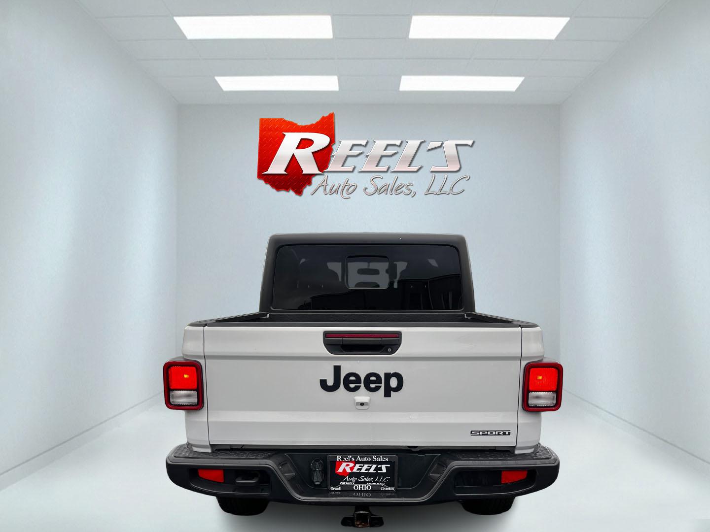 2020 White /Black Jeep Gladiator Sport S (1C6HJTAGXLL) with an 3.6L V6 DOHC 24V engine, 8-Speed Automatic transmission, located at 11115 Chardon Rd. , Chardon, OH, 44024, (440) 214-9705, 41.580246, -81.241943 - This 2020 Jeep Gladiator Sport S is a versatile midsize pickup renowned for its robust capabilities and modern features. Powered by a 3.6L Pentastar V6 engine paired with an 8-speed automatic transmission, it delivers a solid highway mileage of 22 MPG. Noteworthy features include a 7.0" touchscreen - Photo#6
