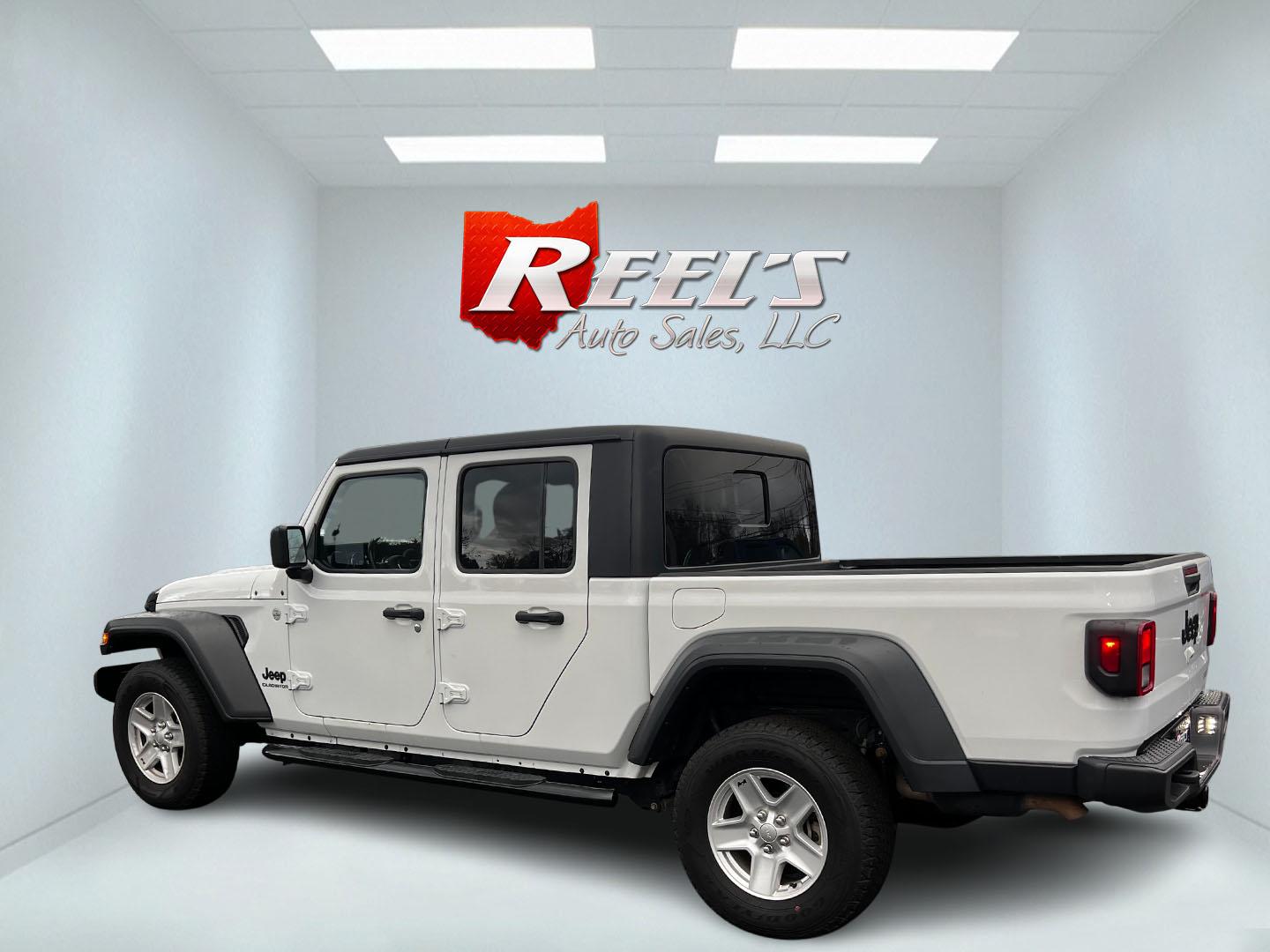 2020 White /Black Jeep Gladiator Sport S (1C6HJTAGXLL) with an 3.6L V6 DOHC 24V engine, 8-Speed Automatic transmission, located at 11115 Chardon Rd. , Chardon, OH, 44024, (440) 214-9705, 41.580246, -81.241943 - This 2020 Jeep Gladiator Sport S is a versatile midsize pickup renowned for its robust capabilities and modern features. Powered by a 3.6L Pentastar V6 engine paired with an 8-speed automatic transmission, it delivers a solid highway mileage of 22 MPG. Noteworthy features include a 7.0" touchscreen - Photo#8