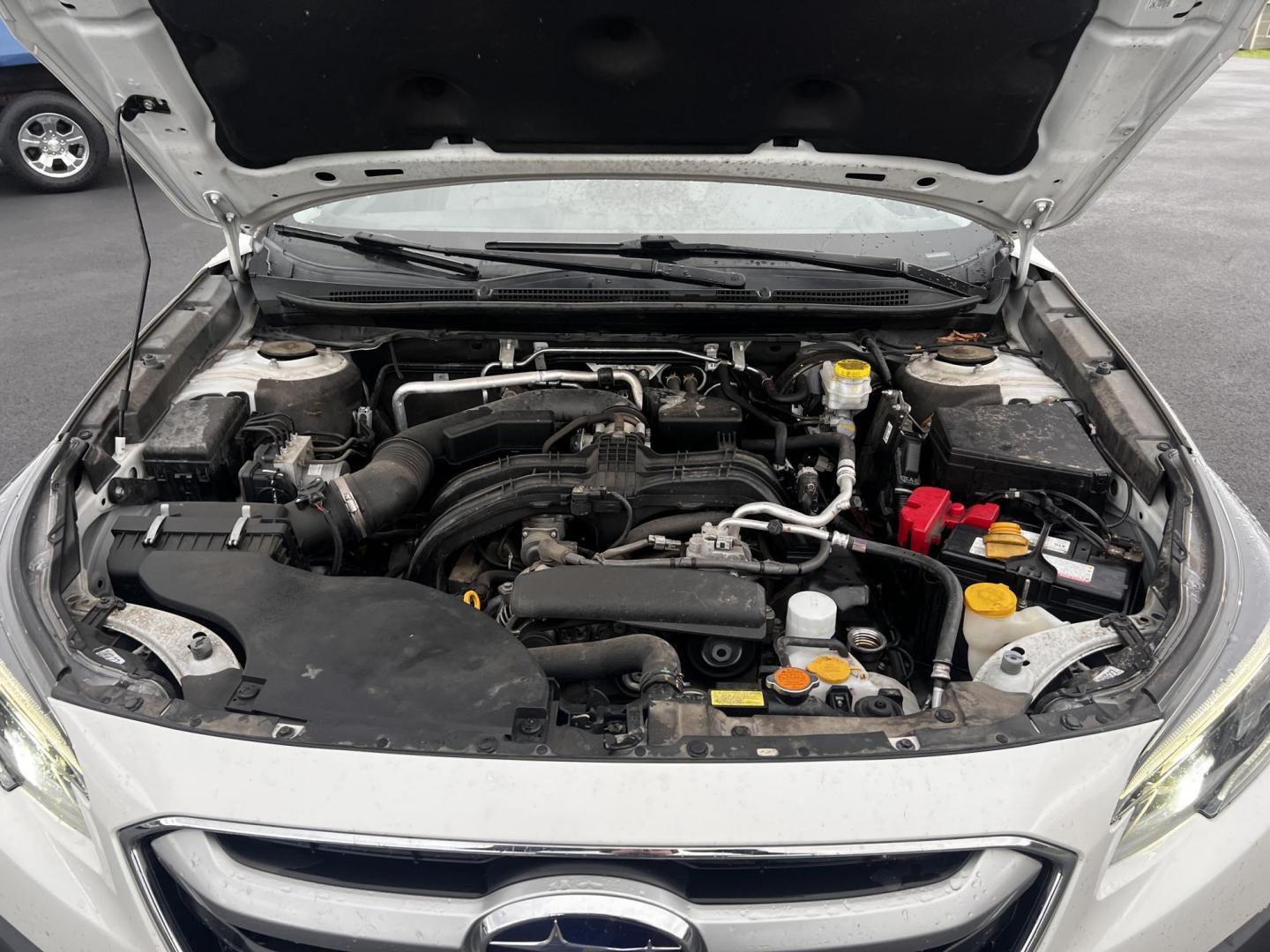 2022 White /Gray Subaru Outback Premium (4S4BTADC0N3) with an 2.5L H4 DOHC 16V engine, Automatic transmission, located at 11115 Chardon Rd. , Chardon, OH, 44024, (440) 214-9705, 41.580246, -81.241943 - This 2022 Subaru Outback Premium is a well-rounded SUV with a focus on comfort, technology, and safety. It features a 2.5L H4 engine with the brand's signature Symmetrical All-Wheel Drive, providing excellent traction and stability. With a highway fuel efficiency of 33 MPG, it balances performance w - Photo#3