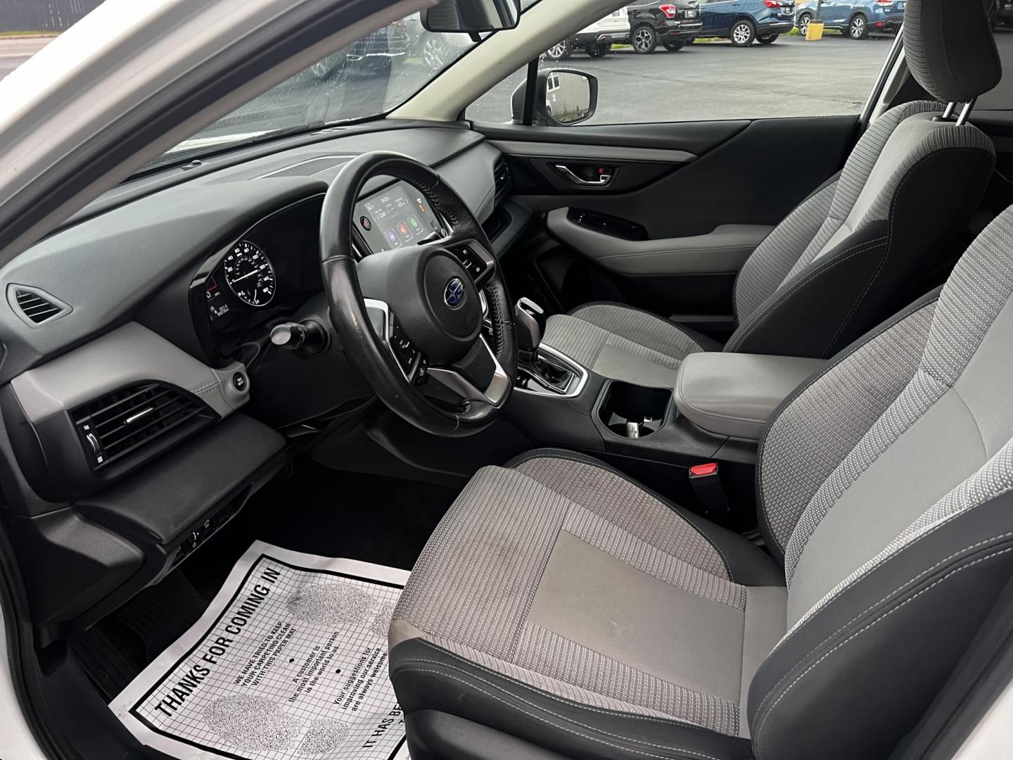 2022 White /Gray Subaru Outback Premium (4S4BTADC0N3) with an 2.5L H4 DOHC 16V engine, Automatic transmission, located at 11115 Chardon Rd. , Chardon, OH, 44024, (440) 214-9705, 41.580246, -81.241943 - This 2022 Subaru Outback Premium is a well-rounded SUV with a focus on comfort, technology, and safety. It features a 2.5L H4 engine with the brand's signature Symmetrical All-Wheel Drive, providing excellent traction and stability. With a highway fuel efficiency of 33 MPG, it balances performance w - Photo#4