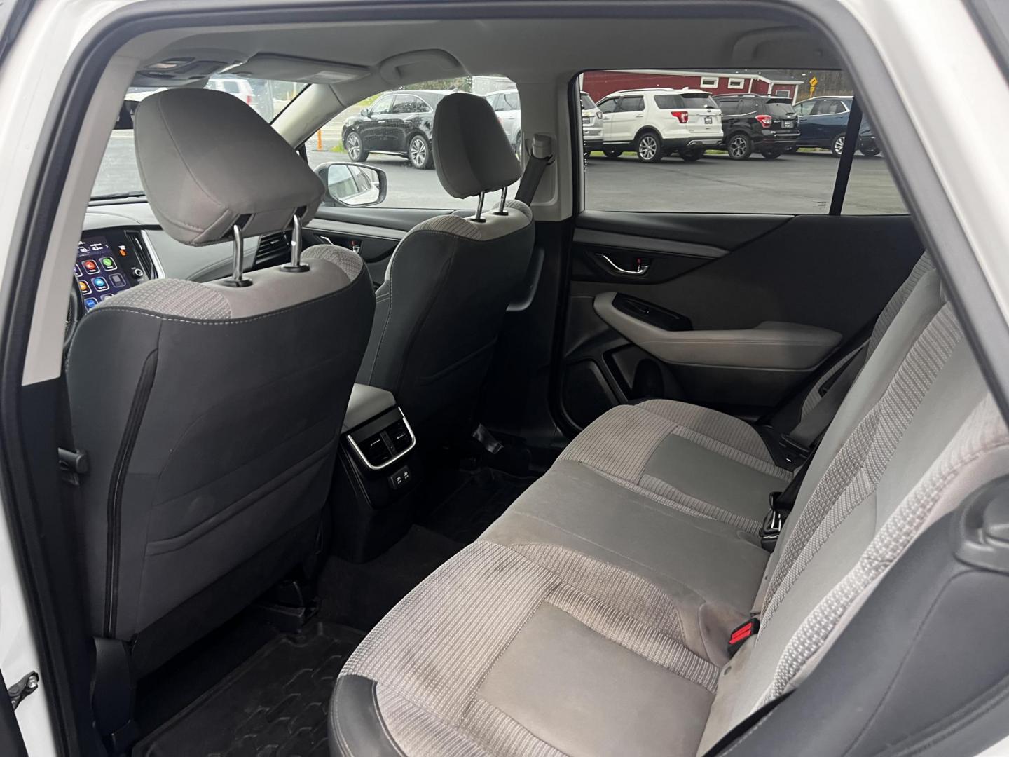 2022 White /Gray Subaru Outback Premium (4S4BTADC0N3) with an 2.5L H4 DOHC 16V engine, Automatic transmission, located at 11115 Chardon Rd. , Chardon, OH, 44024, (440) 214-9705, 41.580246, -81.241943 - This 2022 Subaru Outback Premium is a well-rounded SUV with a focus on comfort, technology, and safety. It features a 2.5L H4 engine with the brand's signature Symmetrical All-Wheel Drive, providing excellent traction and stability. With a highway fuel efficiency of 33 MPG, it balances performance w - Photo#27