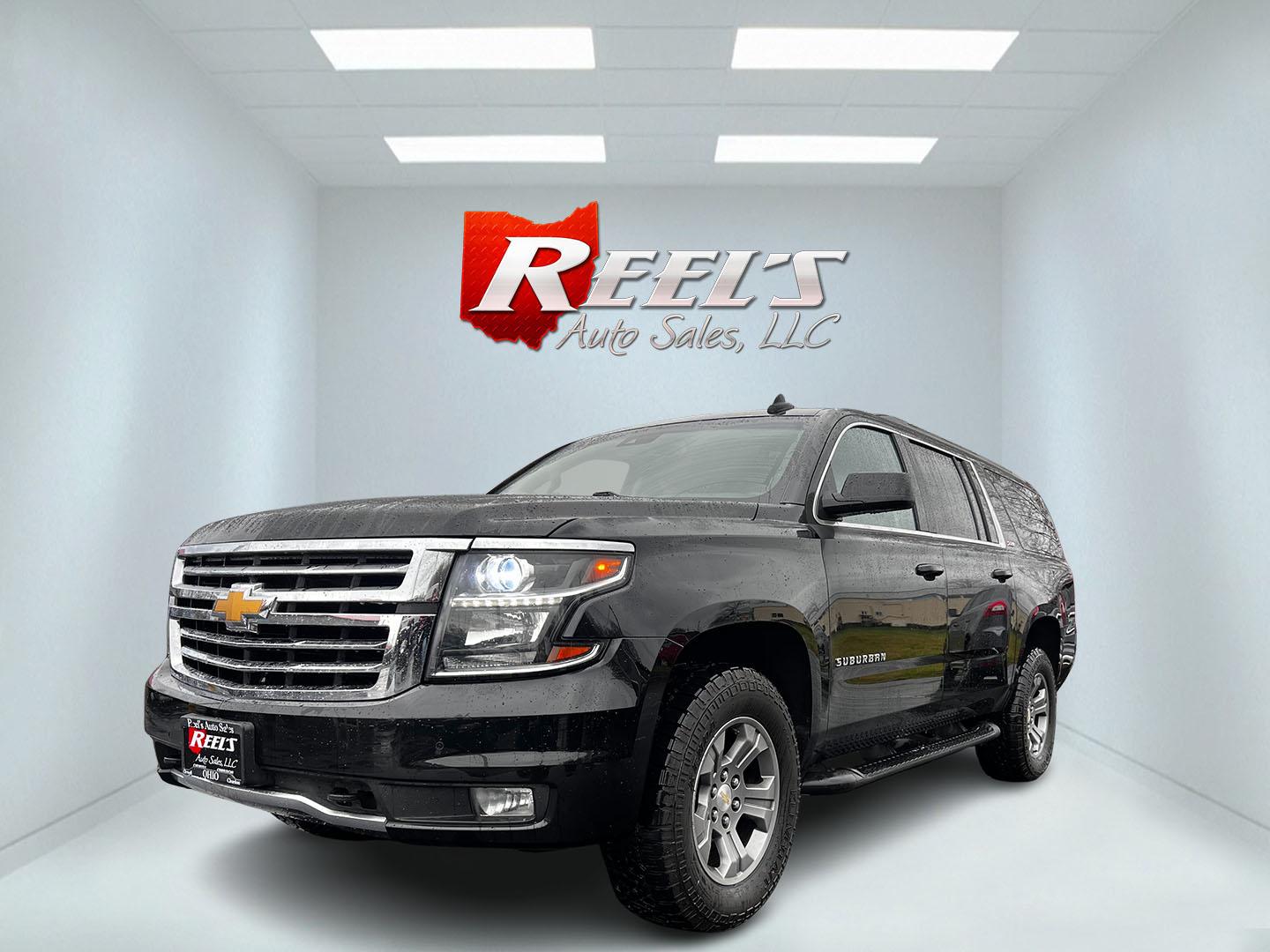 2018 Black /Brown Chevrolet Suburban LT Z71 4WD (1GNSKHKC1JR) with an 5.3L V8 OHV 16V engine, 6A transmission, located at 547 E. Main St., Orwell, OH, 44076, (440) 437-5893, 41.535435, -80.847855 - Photo#0