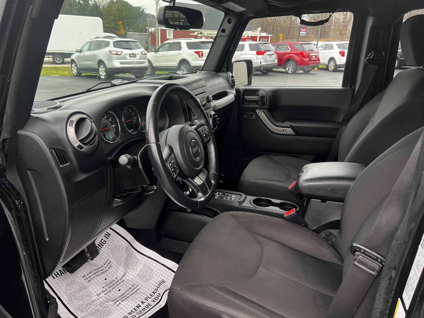 2015 Black /Black Jeep Wrangler Unlimited Sport 4WD (1C4BJWDG6FL) with an 3.6L V6 DOHC 24V FFV engine, located at 11115 Chardon Rd. , Chardon, OH, 44024, (440) 214-9705, 41.580246, -81.241943 - Photo#16