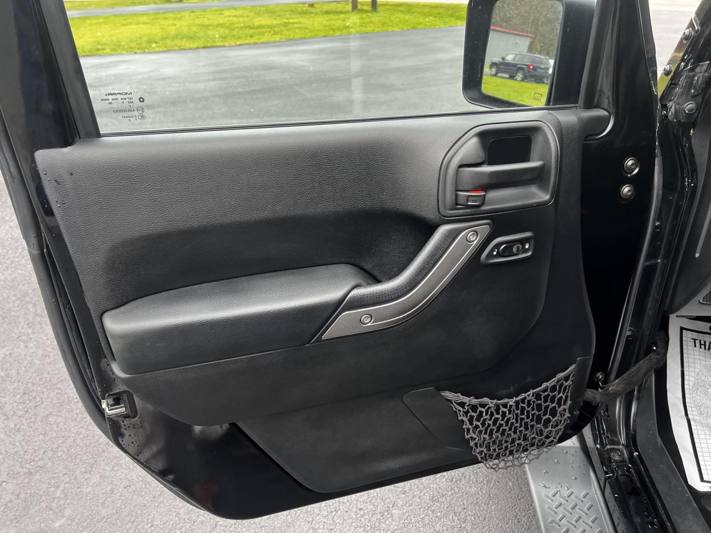 2015 Black /Black Jeep Wrangler Unlimited Sport 4WD (1C4BJWDG6FL) with an 3.6L V6 DOHC 24V FFV engine, located at 11115 Chardon Rd. , Chardon, OH, 44024, (440) 214-9705, 41.580246, -81.241943 - Photo#18
