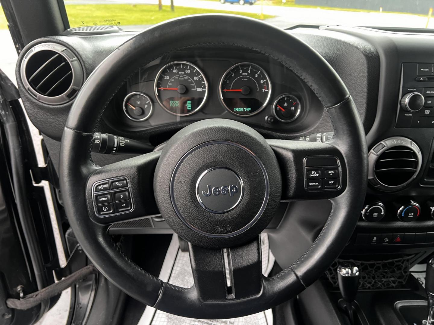 2015 Black /Black Jeep Wrangler Unlimited Sport 4WD (1C4BJWDG6FL) with an 3.6L V6 DOHC 24V FFV engine, located at 11115 Chardon Rd. , Chardon, OH, 44024, (440) 214-9705, 41.580246, -81.241943 - Photo#20