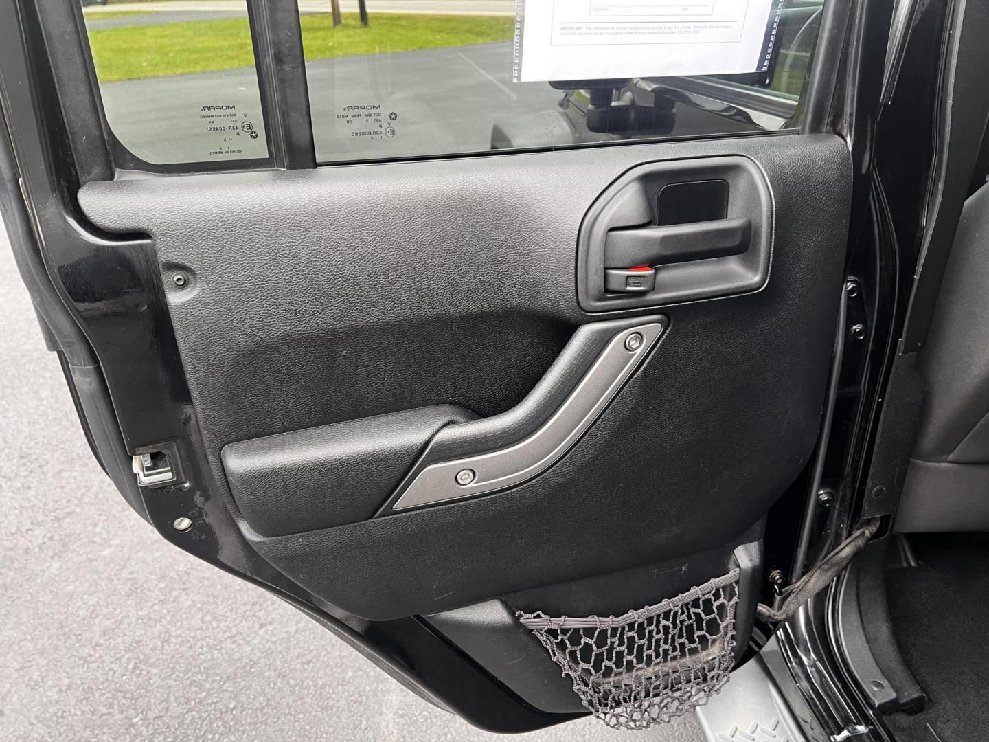 2015 Black /Black Jeep Wrangler Unlimited Sport 4WD (1C4BJWDG6FL) with an 3.6L V6 DOHC 24V FFV engine, located at 11115 Chardon Rd. , Chardon, OH, 44024, (440) 214-9705, 41.580246, -81.241943 - Photo#30