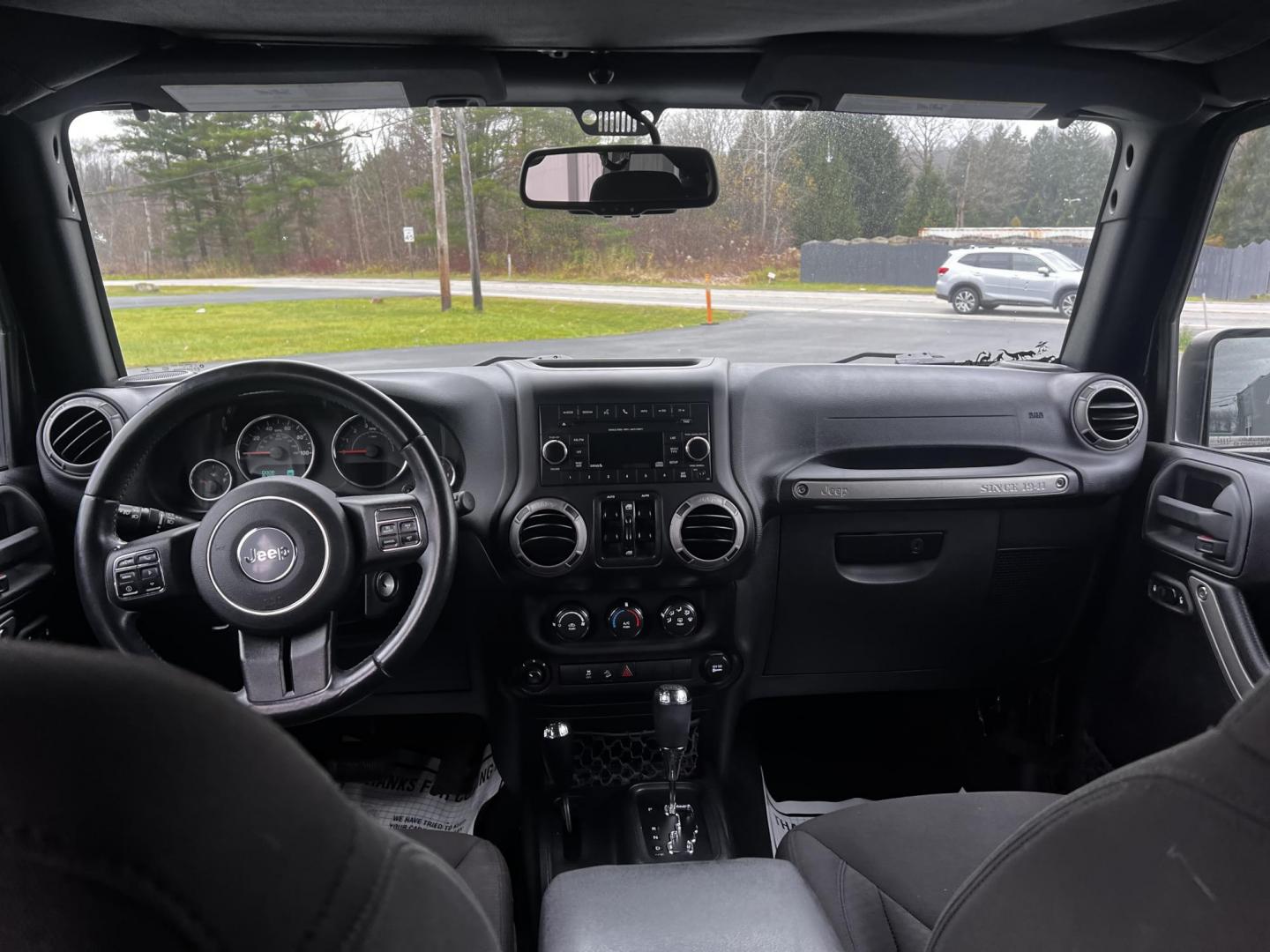 2015 Black /Black Jeep Wrangler Unlimited Sport 4WD (1C4BJWDG6FL) with an 3.6L V6 DOHC 24V FFV engine, located at 11115 Chardon Rd. , Chardon, OH, 44024, (440) 214-9705, 41.580246, -81.241943 - Photo#31