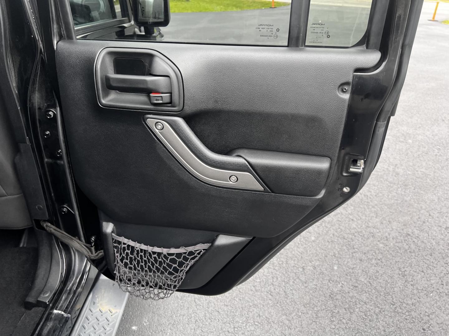 2015 Black /Black Jeep Wrangler Unlimited Sport 4WD (1C4BJWDG6FL) with an 3.6L V6 DOHC 24V FFV engine, located at 11115 Chardon Rd. , Chardon, OH, 44024, (440) 214-9705, 41.580246, -81.241943 - Photo#32