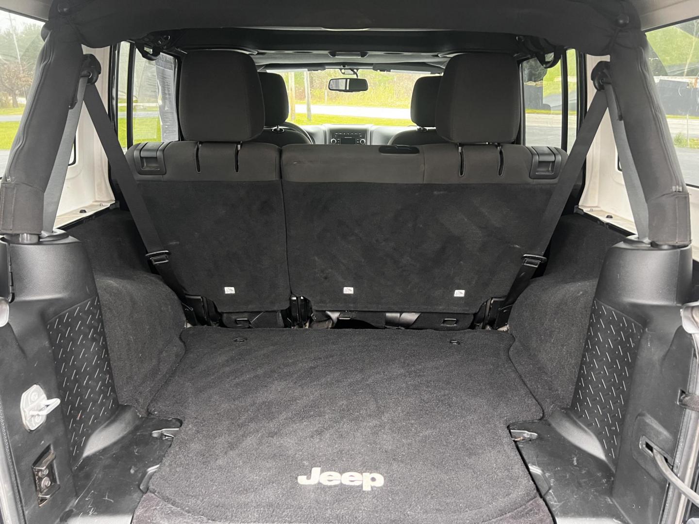 2015 Black /Black Jeep Wrangler Unlimited Sport 4WD (1C4BJWDG6FL) with an 3.6L V6 DOHC 24V FFV engine, located at 11115 Chardon Rd. , Chardon, OH, 44024, (440) 214-9705, 41.580246, -81.241943 - Photo#33