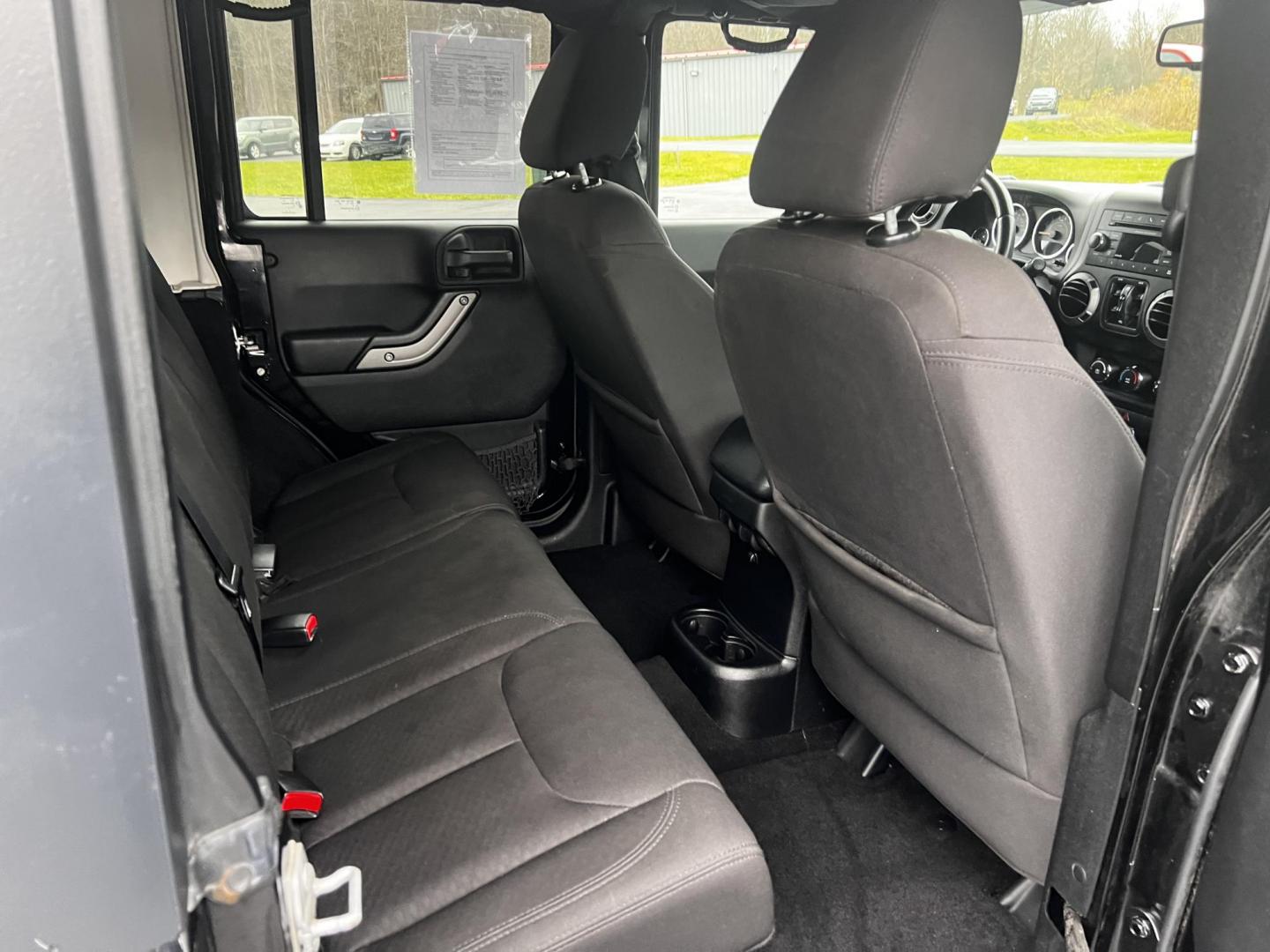 2015 Black /Black Jeep Wrangler Unlimited Sport 4WD (1C4BJWDG6FL) with an 3.6L V6 DOHC 24V FFV engine, located at 11115 Chardon Rd. , Chardon, OH, 44024, (440) 214-9705, 41.580246, -81.241943 - Photo#34