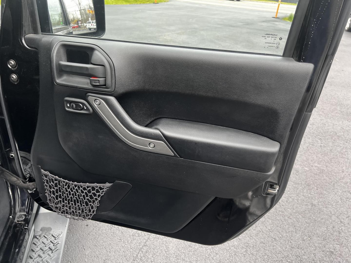2015 Black /Black Jeep Wrangler Unlimited Sport 4WD (1C4BJWDG6FL) with an 3.6L V6 DOHC 24V FFV engine, located at 11115 Chardon Rd. , Chardon, OH, 44024, (440) 214-9705, 41.580246, -81.241943 - Photo#37