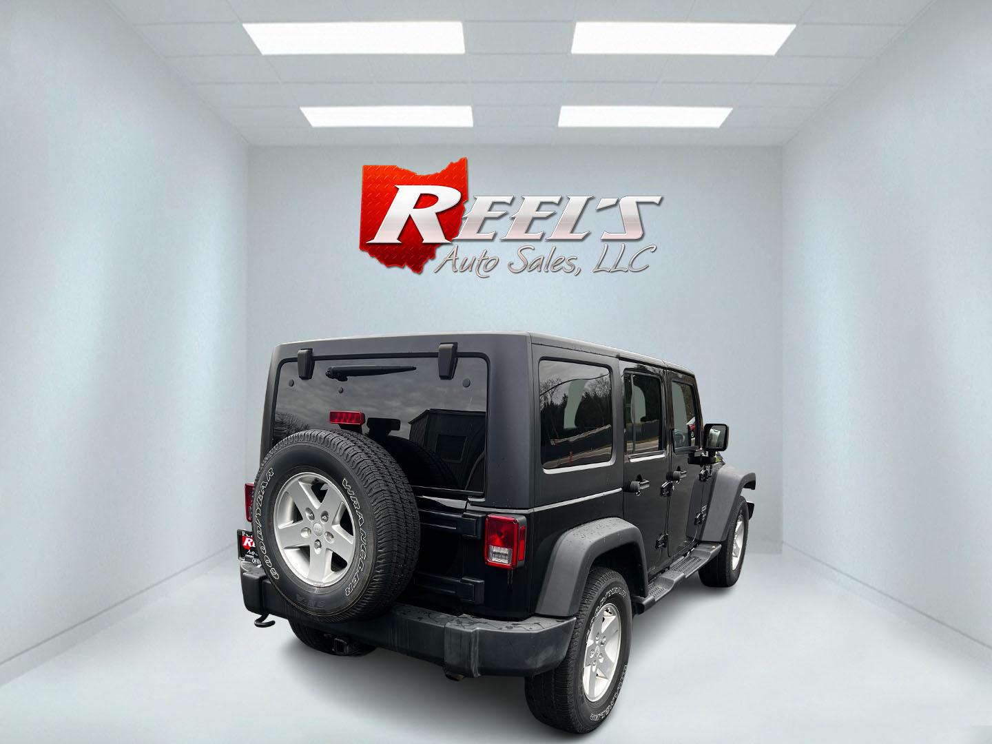2015 Black /Black Jeep Wrangler Unlimited Sport 4WD (1C4BJWDG6FL) with an 3.6L V6 DOHC 24V FFV engine, located at 11115 Chardon Rd. , Chardon, OH, 44024, (440) 214-9705, 41.580246, -81.241943 - Photo#5
