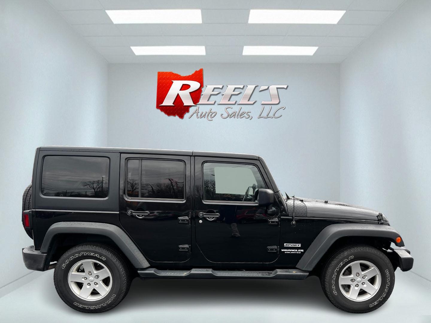 2015 Black /Black Jeep Wrangler Unlimited Sport 4WD (1C4BJWDG6FL) with an 3.6L V6 DOHC 24V FFV engine, located at 11115 Chardon Rd. , Chardon, OH, 44024, (440) 214-9705, 41.580246, -81.241943 - Photo#4
