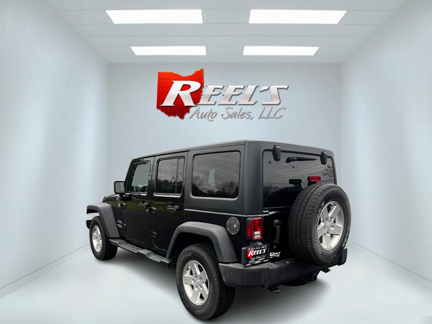 2015 Black /Black Jeep Wrangler Unlimited Sport 4WD (1C4BJWDG6FL) with an 3.6L V6 DOHC 24V FFV engine, located at 11115 Chardon Rd. , Chardon, OH, 44024, (440) 214-9705, 41.580246, -81.241943 - Photo#7