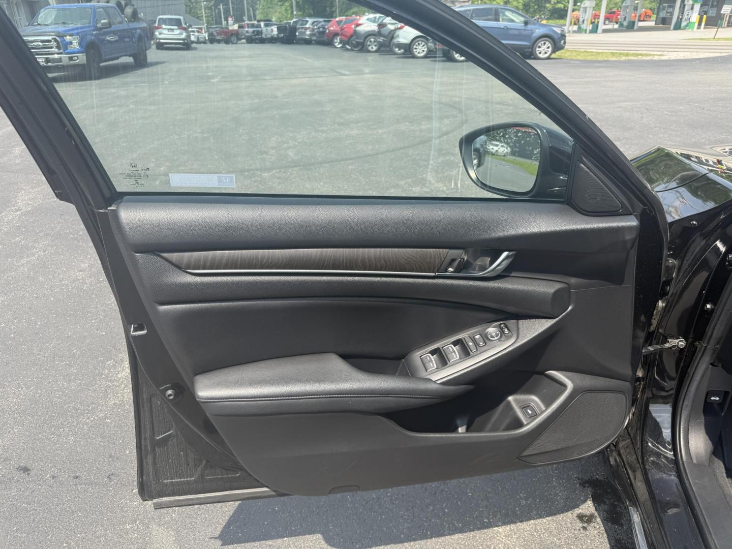 2019 Black /Black Honda Accord EX CVT (1HGCV1F48KA) with an 1.5L I4 DOHC 16V TURBO engine, Automatic transmission, located at 11115 Chardon Rd. , Chardon, OH, 44024, (440) 214-9705, 41.580246, -81.241943 - This 2019 Honda Accord EX is a midsize sedan that impresses with its 1.5-liter turbocharged I4 engine, achieving an efficient 38 MPG on the highway. It combines performance with a suite of practical features, including LED exterior lighting, a power driver's seat, and the Honda Safety Suite, which e - Photo#24