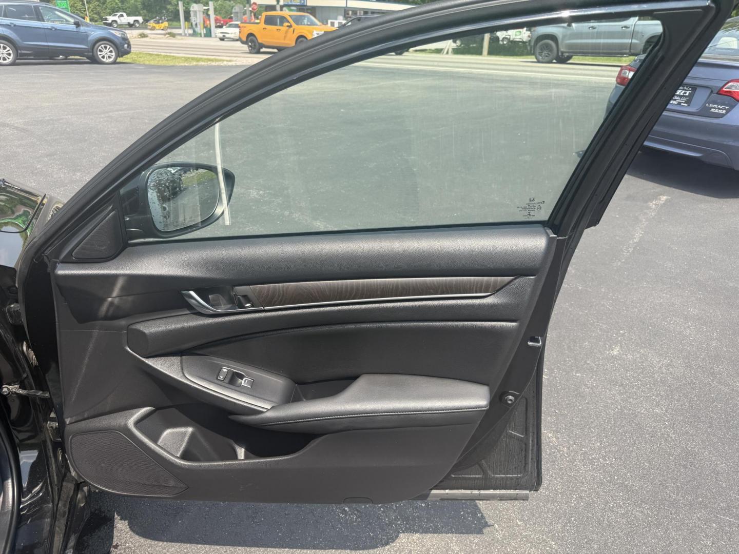 2019 Black /Black Honda Accord EX CVT (1HGCV1F48KA) with an 1.5L I4 DOHC 16V TURBO engine, Automatic transmission, located at 11115 Chardon Rd. , Chardon, OH, 44024, (440) 214-9705, 41.580246, -81.241943 - This 2019 Honda Accord EX is a midsize sedan that impresses with its 1.5-liter turbocharged I4 engine, achieving an efficient 38 MPG on the highway. It combines performance with a suite of practical features, including LED exterior lighting, a power driver's seat, and the Honda Safety Suite, which e - Photo#41