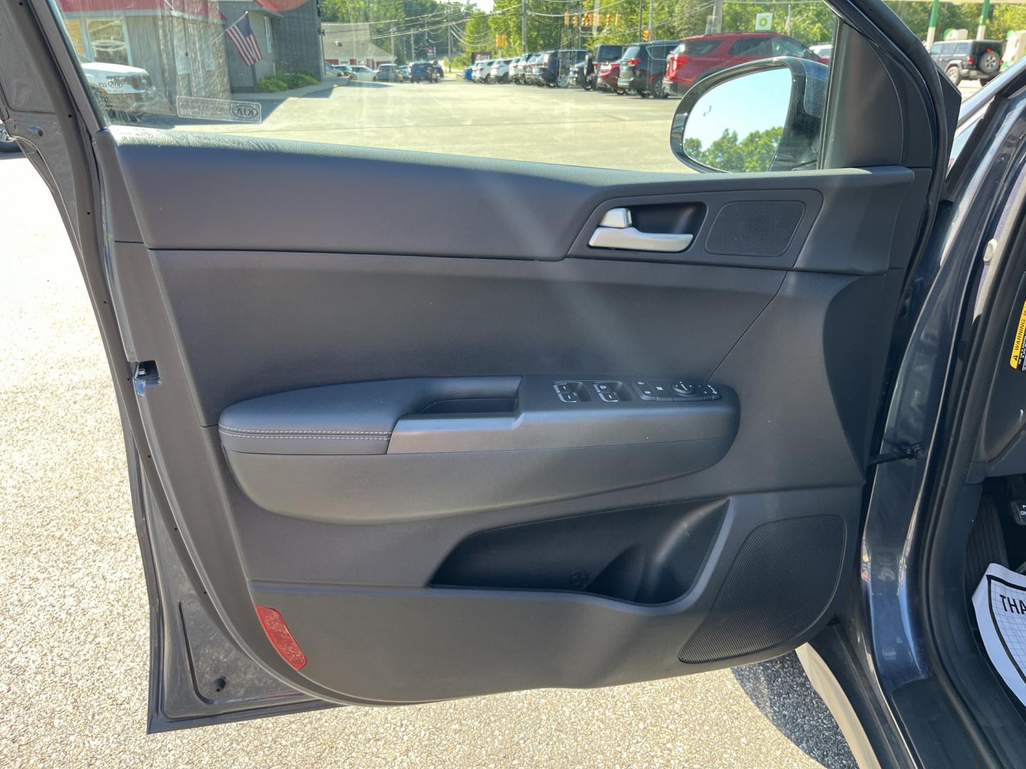 2022 Blue /Black Kia Sportage LX AWD (KNDPMCAC6N7) with an 2.4L I4 DOHC 24V engine, Automatic transmission, located at 11115 Chardon Rd. , Chardon, OH, 44024, (440) 214-9705, 41.580246, -81.241943 - 2022 Kia Sportage LX AWD – Practical Compact SUV with Modern Safety and Everyday Comfort If you want a compact SUV that feels current, efficient, and easy to live with, this 2022 Kia Sportage LX AWD is a strong option. The 2.4L GDI engine and 6-speed automatic deliver smooth everyday power, while- Photo#15