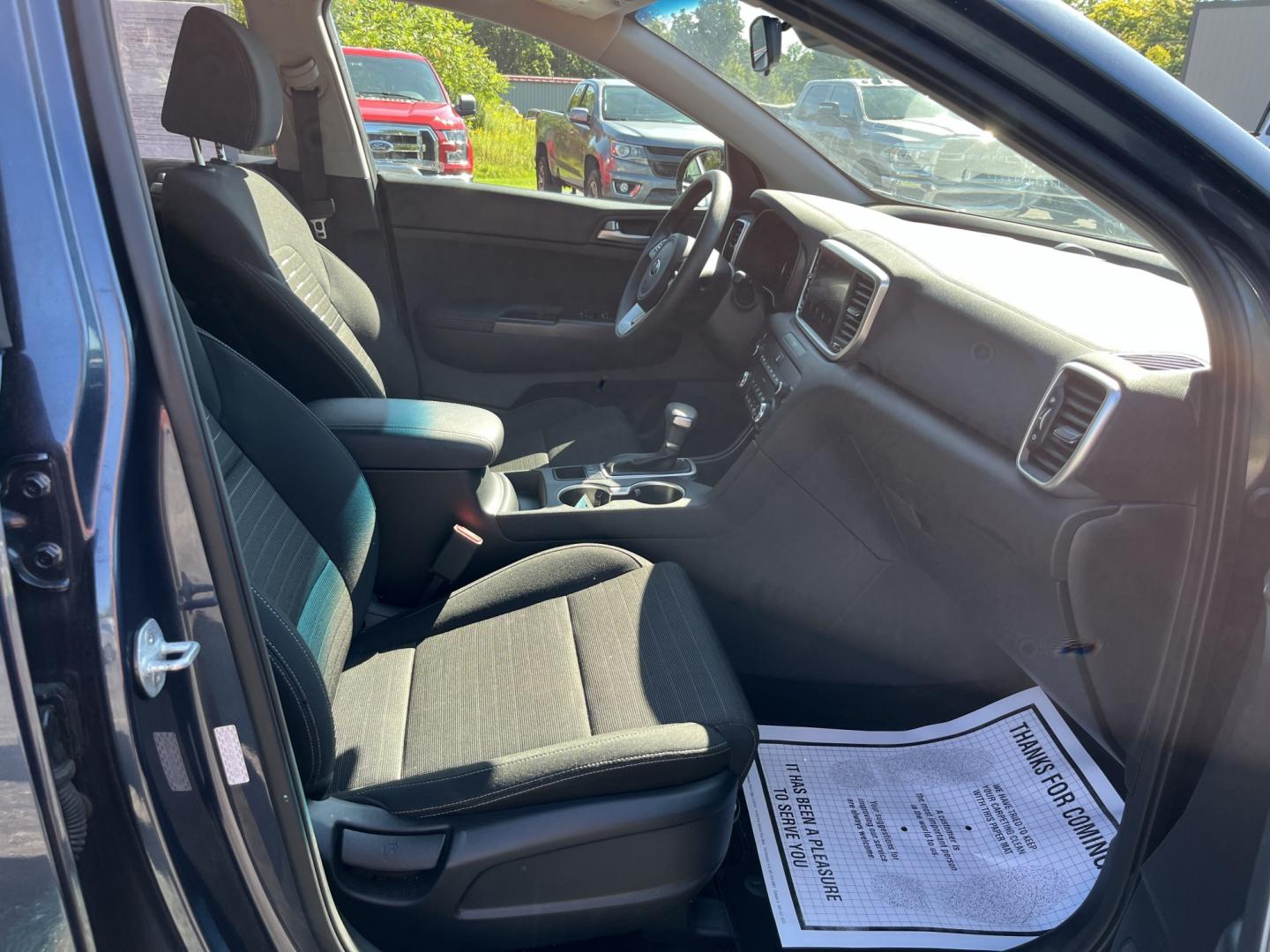 2022 Blue /Black Kia Sportage LX AWD (KNDPMCAC6N7) with an 2.4L I4 DOHC 24V engine, Automatic transmission, located at 11115 Chardon Rd. , Chardon, OH, 44024, (440) 214-9705, 41.580246, -81.241943 - 2022 Kia Sportage LX AWD – Practical Compact SUV with Modern Safety and Everyday Comfort If you want a compact SUV that feels current, efficient, and easy to live with, this 2022 Kia Sportage LX AWD is a strong option. The 2.4L GDI engine and 6-speed automatic deliver smooth everyday power, while- Photo#34