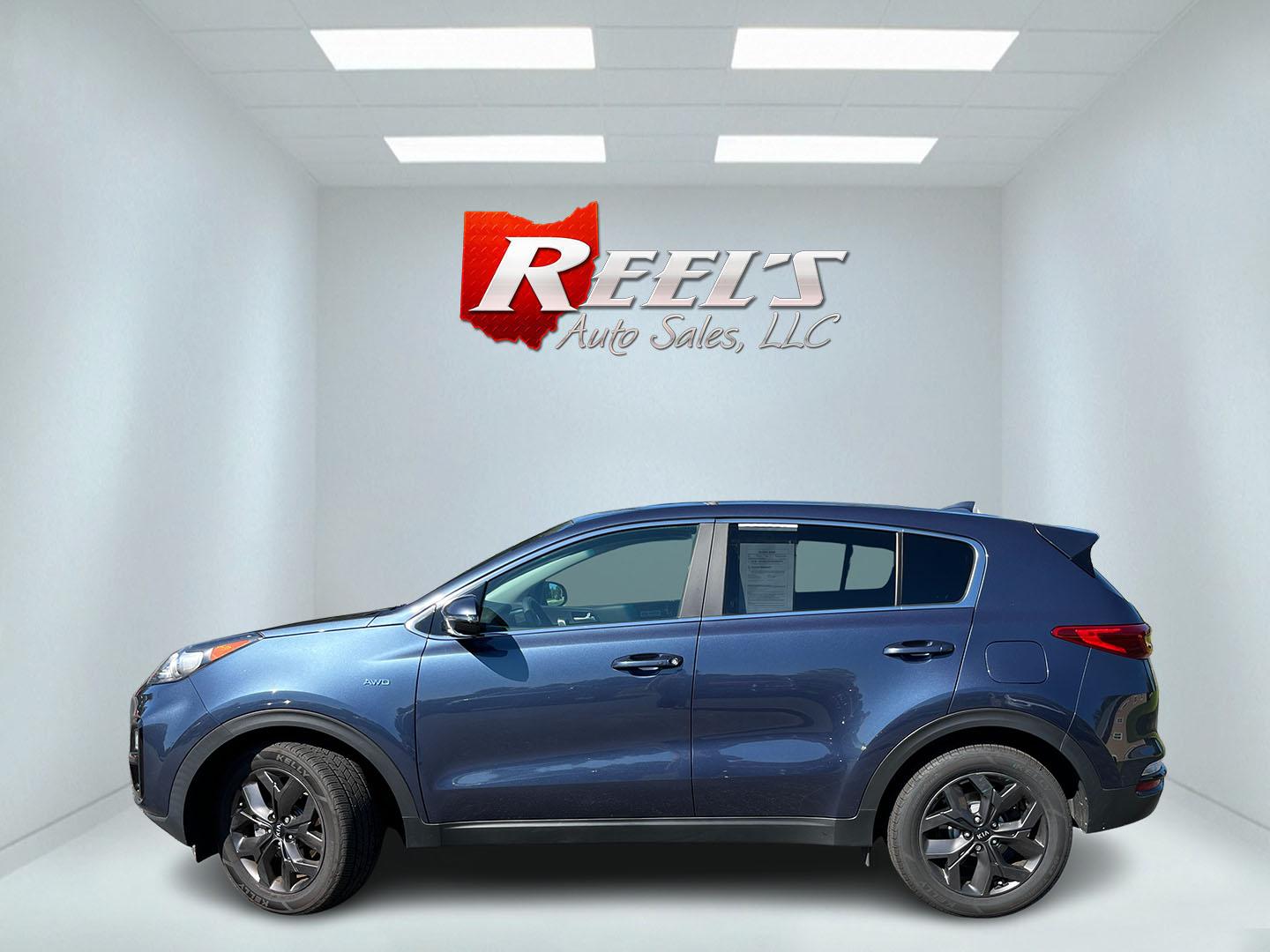 2022 Blue /Black Kia Sportage LX AWD (KNDPMCAC6N7) with an 2.4L I4 DOHC 24V engine, Automatic transmission, located at 11115 Chardon Rd. , Chardon, OH, 44024, (440) 214-9705, 41.580246, -81.241943 - 2022 Kia Sportage LX AWD – Practical Compact SUV with Modern Safety and Everyday Comfort If you want a compact SUV that feels current, efficient, and easy to live with, this 2022 Kia Sportage LX AWD is a strong option. The 2.4L GDI engine and 6-speed automatic deliver smooth everyday power, while- Photo#11