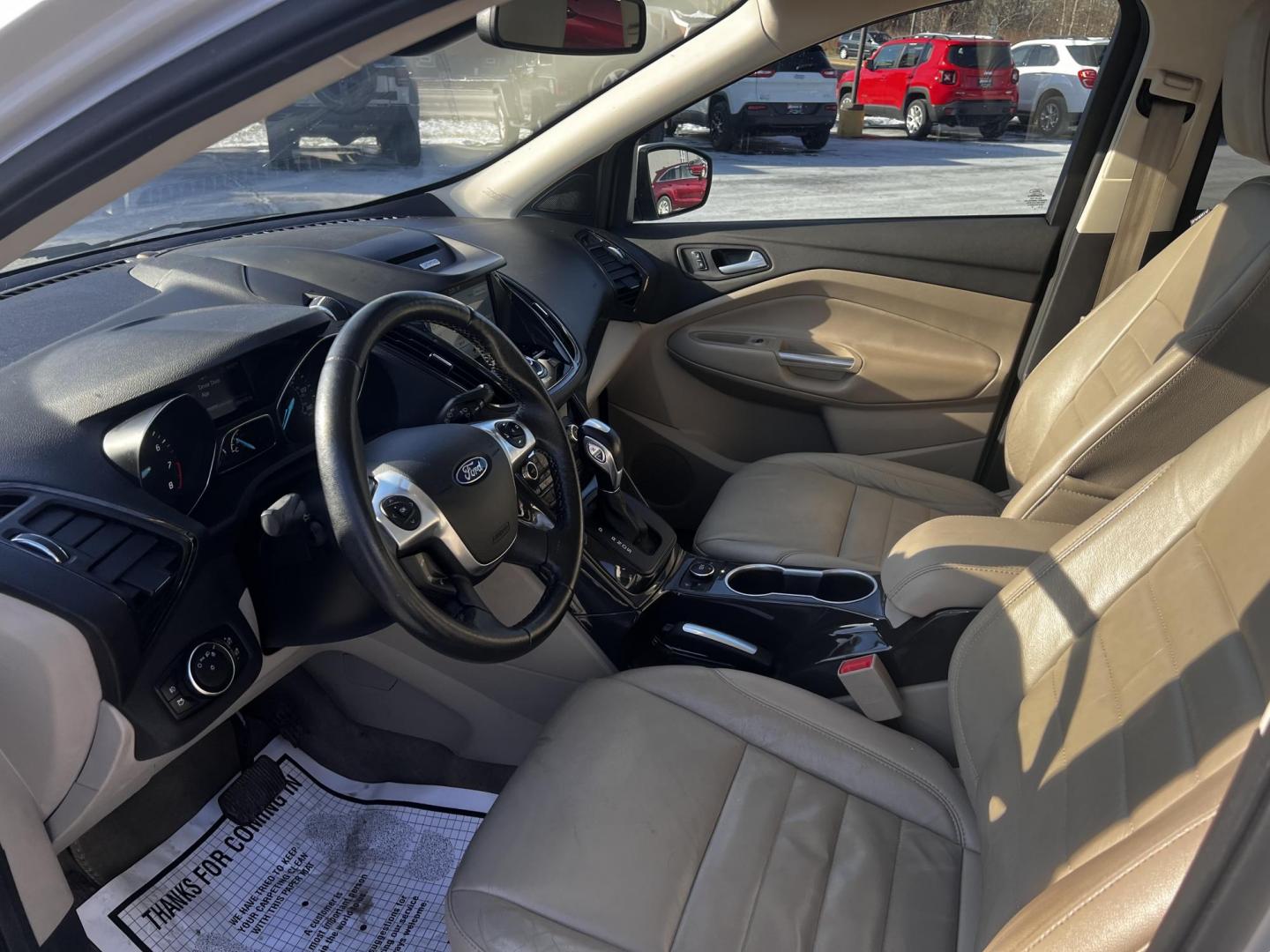2016 White /Gray Ford Escape Titanium 4WD (1FMCU9J93GU) with an 2.0L I4 DOHC 16V Turbo engine, 6-Speed Automatic transmission, located at 547 E. Main St., Orwell, OH, 44076, (440) 437-5893, 41.535435, -80.847855 - Photo#4