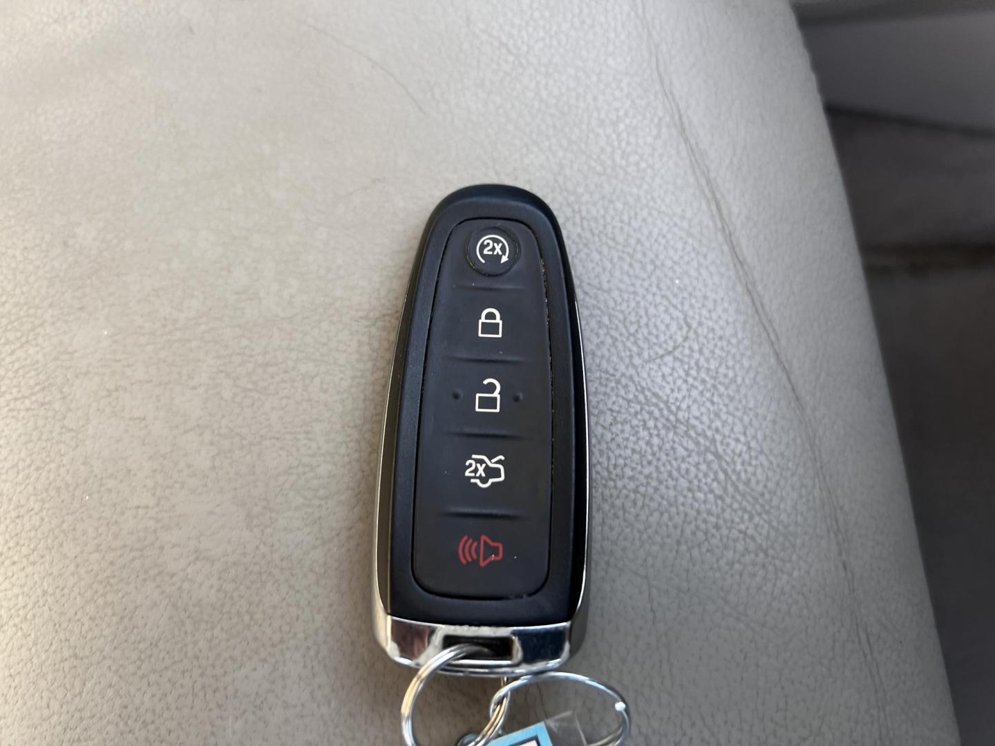 2016 White /Gray Ford Escape Titanium 4WD (1FMCU9J93GU) with an 2.0L I4 DOHC 16V Turbo engine, 6-Speed Automatic transmission, located at 547 E. Main St., Orwell, OH, 44076, (440) 437-5893, 41.535435, -80.847855 - Photo#44