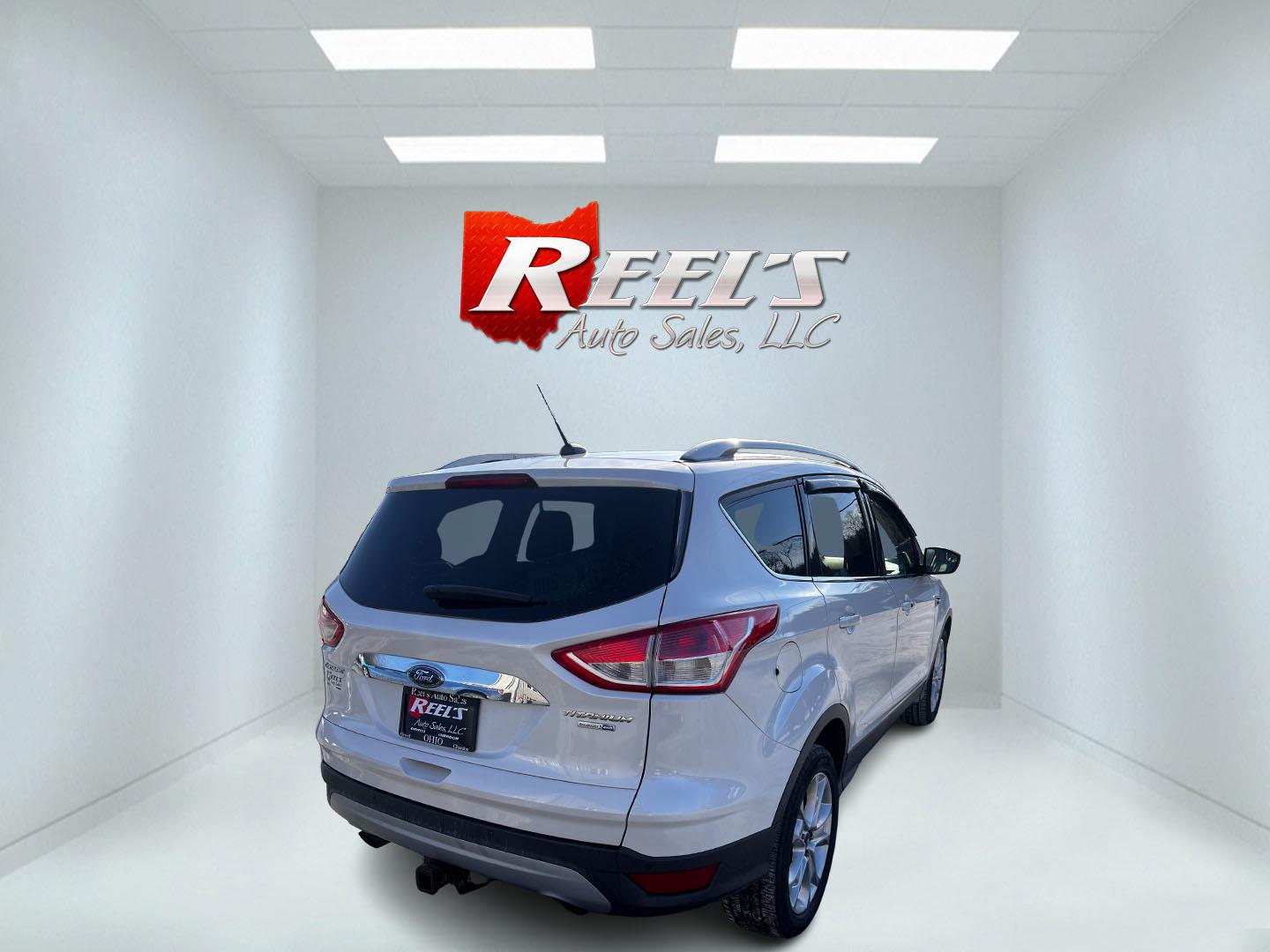 2016 White /Gray Ford Escape Titanium 4WD (1FMCU9J93GU) with an 2.0L I4 DOHC 16V Turbo engine, 6-Speed Automatic transmission, located at 547 E. Main St., Orwell, OH, 44076, (440) 437-5893, 41.535435, -80.847855 - Photo#17