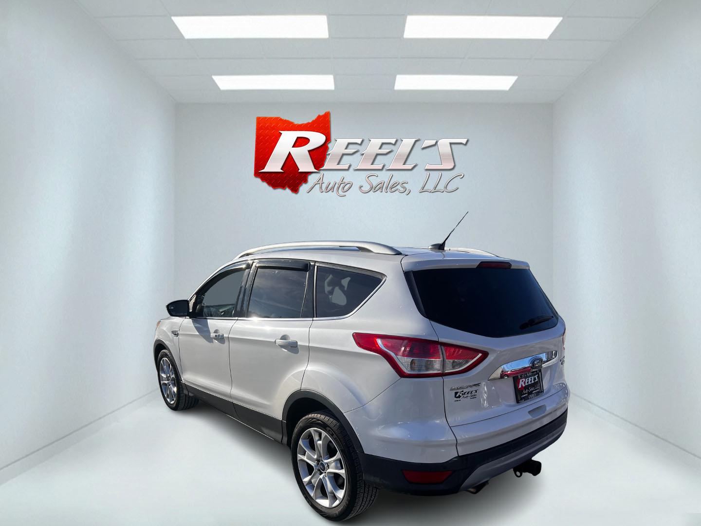 2016 White /Gray Ford Escape Titanium 4WD (1FMCU9J93GU) with an 2.0L I4 DOHC 16V Turbo engine, 6-Speed Automatic transmission, located at 547 E. Main St., Orwell, OH, 44076, (440) 437-5893, 41.535435, -80.847855 - Photo#19