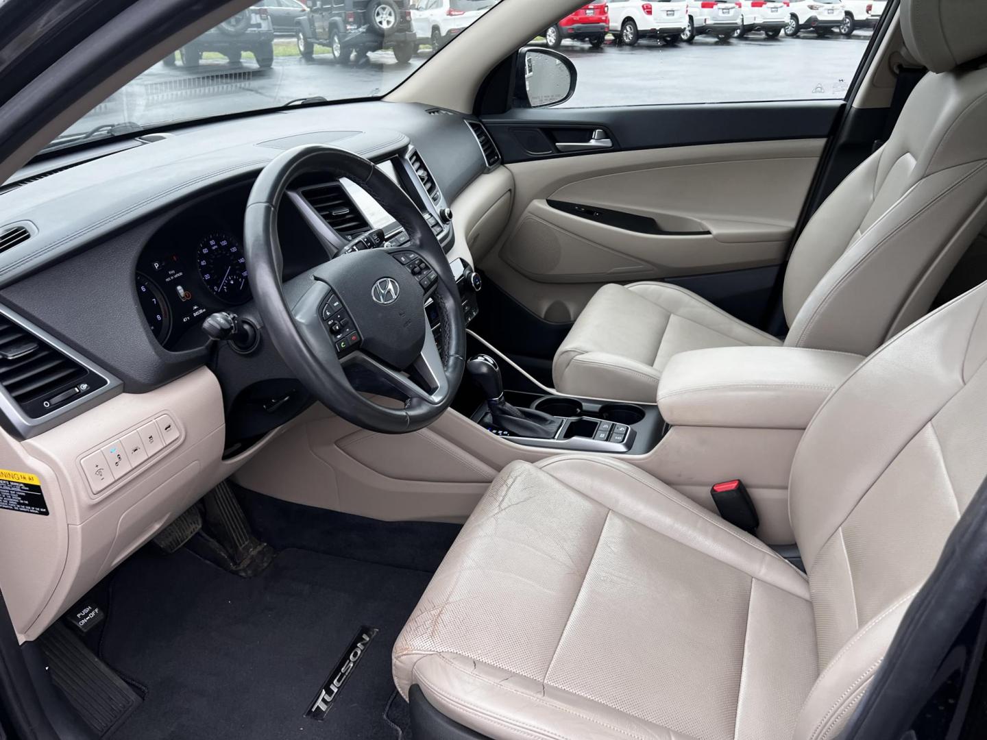 2016 Black /Black Hyundai Tucson Limited Ultimate AWD (KM8J3CA23GU) with an 1.6L I4 DOHC 16V TURBO engine, 7A transmission, located at 547 E. Main St., Orwell, OH, 44076, (440) 437-5893, 41.535435, -80.847855 - This One Owner 2016 Hyundai Tucson Limited Ultimate AWD is a compact SUV offering a blend of performance, luxury, and advanced technology. It features a 1.6-liter turbocharged I4 engine coupled with a 7-speed dual-clutch automatic transmission, providing a spirited driving experience. The interior b - Photo#15