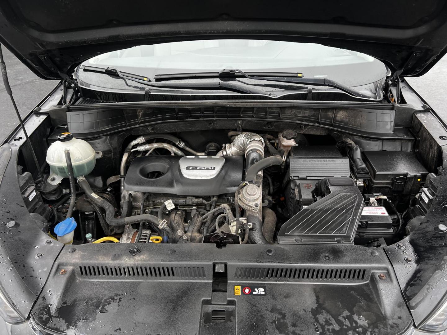 2016 Black /Black Hyundai Tucson Limited Ultimate AWD (KM8J3CA23GU) with an 1.6L I4 DOHC 16V TURBO engine, 7A transmission, located at 547 E. Main St., Orwell, OH, 44076, (440) 437-5893, 41.535435, -80.847855 - This One Owner 2016 Hyundai Tucson Limited Ultimate AWD is a compact SUV offering a blend of performance, luxury, and advanced technology. It features a 1.6-liter turbocharged I4 engine coupled with a 7-speed dual-clutch automatic transmission, providing a spirited driving experience. The interior b - Photo#16