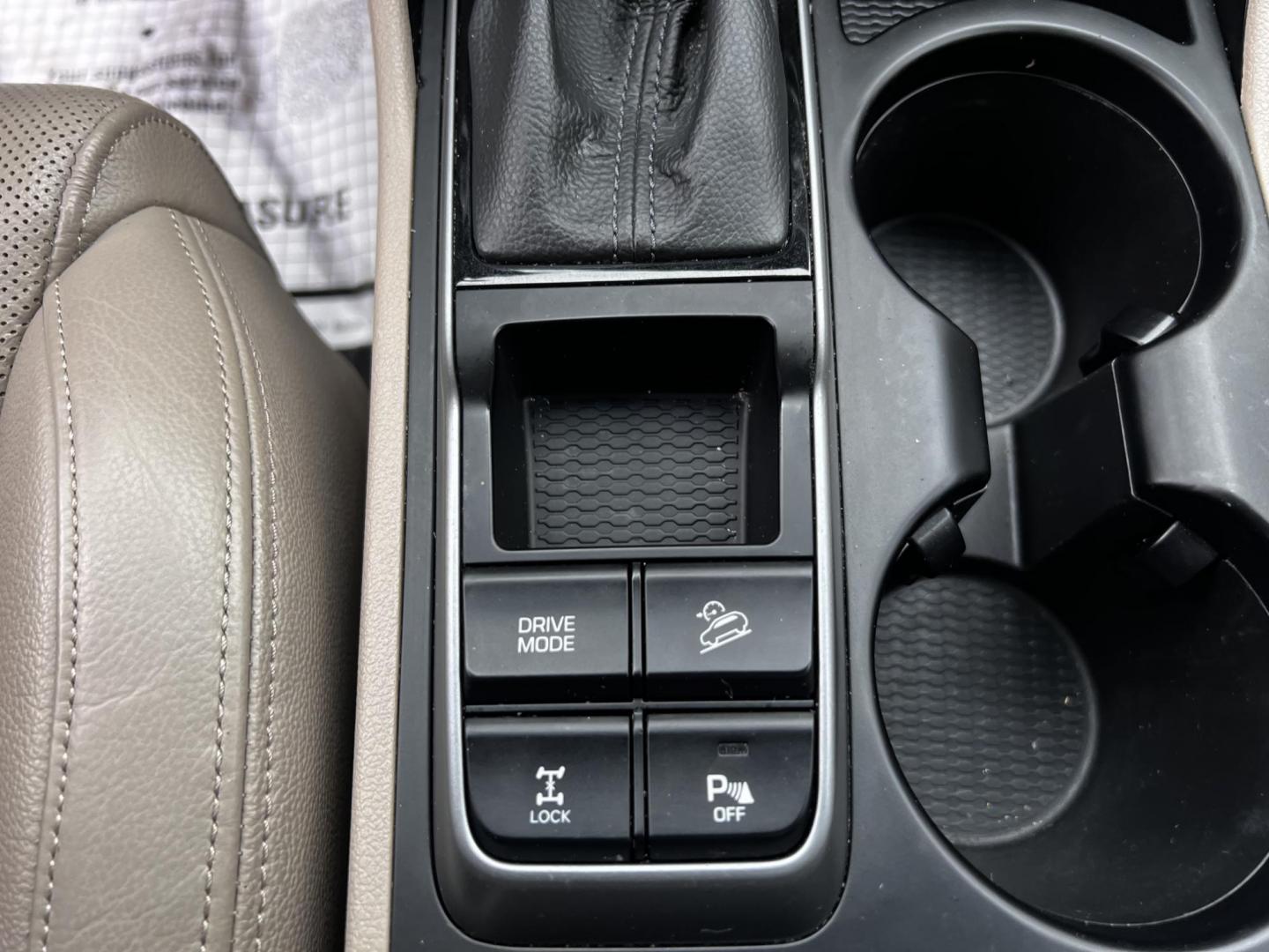 2016 Black /Black Hyundai Tucson Limited Ultimate AWD (KM8J3CA23GU) with an 1.6L I4 DOHC 16V TURBO engine, 7A transmission, located at 547 E. Main St., Orwell, OH, 44076, (440) 437-5893, 41.535435, -80.847855 - This One Owner 2016 Hyundai Tucson Limited Ultimate AWD is a compact SUV offering a blend of performance, luxury, and advanced technology. It features a 1.6-liter turbocharged I4 engine coupled with a 7-speed dual-clutch automatic transmission, providing a spirited driving experience. The interior b - Photo#28