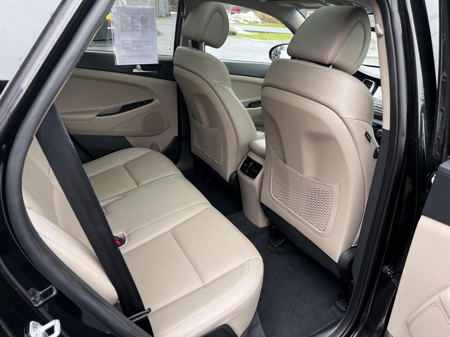 2016 Black /Black Hyundai Tucson Limited Ultimate AWD (KM8J3CA23GU) with an 1.6L I4 DOHC 16V TURBO engine, 7A transmission, located at 547 E. Main St., Orwell, OH, 44076, (440) 437-5893, 41.535435, -80.847855 - This One Owner 2016 Hyundai Tucson Limited Ultimate AWD is a compact SUV offering a blend of performance, luxury, and advanced technology. It features a 1.6-liter turbocharged I4 engine coupled with a 7-speed dual-clutch automatic transmission, providing a spirited driving experience. The interior b - Photo#39