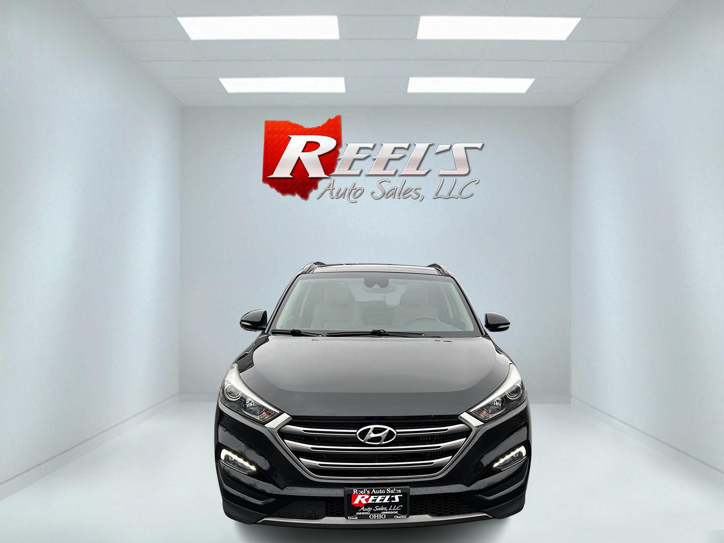 2016 Black /Black Hyundai Tucson Limited Ultimate AWD (KM8J3CA23GU) with an 1.6L I4 DOHC 16V TURBO engine, 7A transmission, located at 547 E. Main St., Orwell, OH, 44076, (440) 437-5893, 41.535435, -80.847855 - This One Owner 2016 Hyundai Tucson Limited Ultimate AWD is a compact SUV offering a blend of performance, luxury, and advanced technology. It features a 1.6-liter turbocharged I4 engine coupled with a 7-speed dual-clutch automatic transmission, providing a spirited driving experience. The interior b - Photo#1