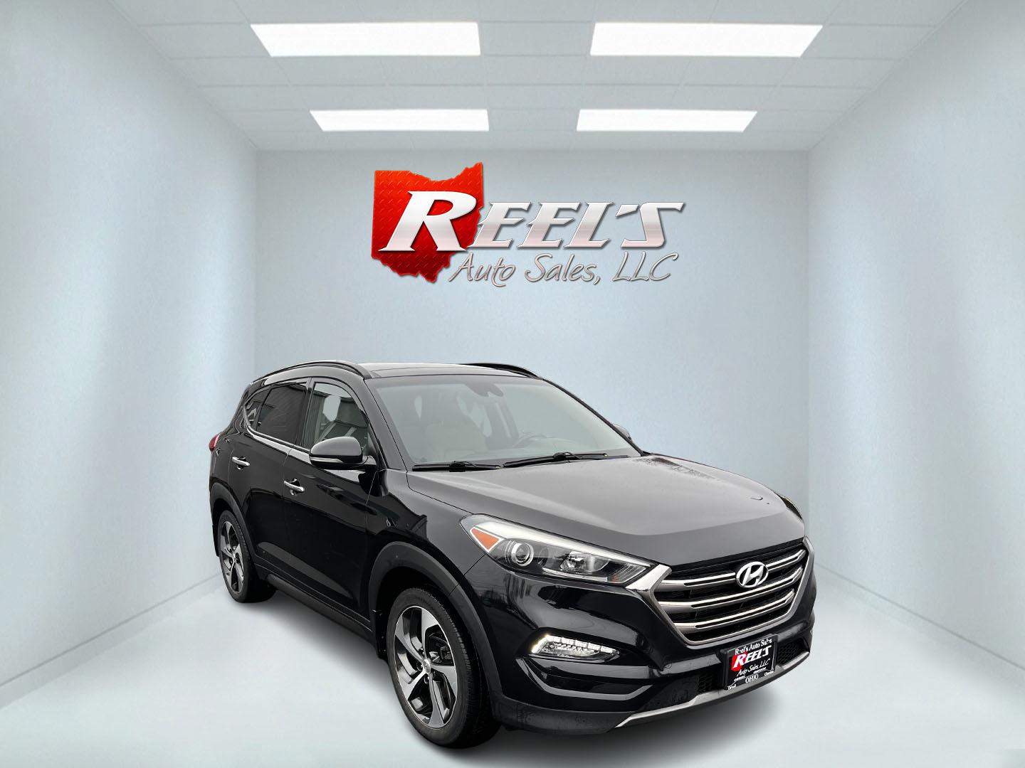 2016 Black /Black Hyundai Tucson Limited Ultimate AWD (KM8J3CA23GU) with an 1.6L I4 DOHC 16V TURBO engine, 7A transmission, located at 547 E. Main St., Orwell, OH, 44076, (440) 437-5893, 41.535435, -80.847855 - This One Owner 2016 Hyundai Tucson Limited Ultimate AWD is a compact SUV offering a blend of performance, luxury, and advanced technology. It features a 1.6-liter turbocharged I4 engine coupled with a 7-speed dual-clutch automatic transmission, providing a spirited driving experience. The interior b - Photo#2