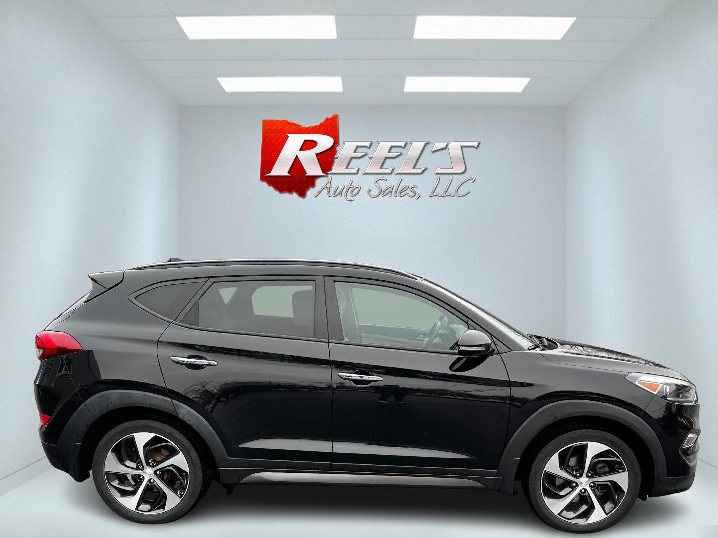 2016 Black /Black Hyundai Tucson Limited Ultimate AWD (KM8J3CA23GU) with an 1.6L I4 DOHC 16V TURBO engine, 7A transmission, located at 547 E. Main St., Orwell, OH, 44076, (440) 437-5893, 41.535435, -80.847855 - This One Owner 2016 Hyundai Tucson Limited Ultimate AWD is a compact SUV offering a blend of performance, luxury, and advanced technology. It features a 1.6-liter turbocharged I4 engine coupled with a 7-speed dual-clutch automatic transmission, providing a spirited driving experience. The interior b - Photo#4