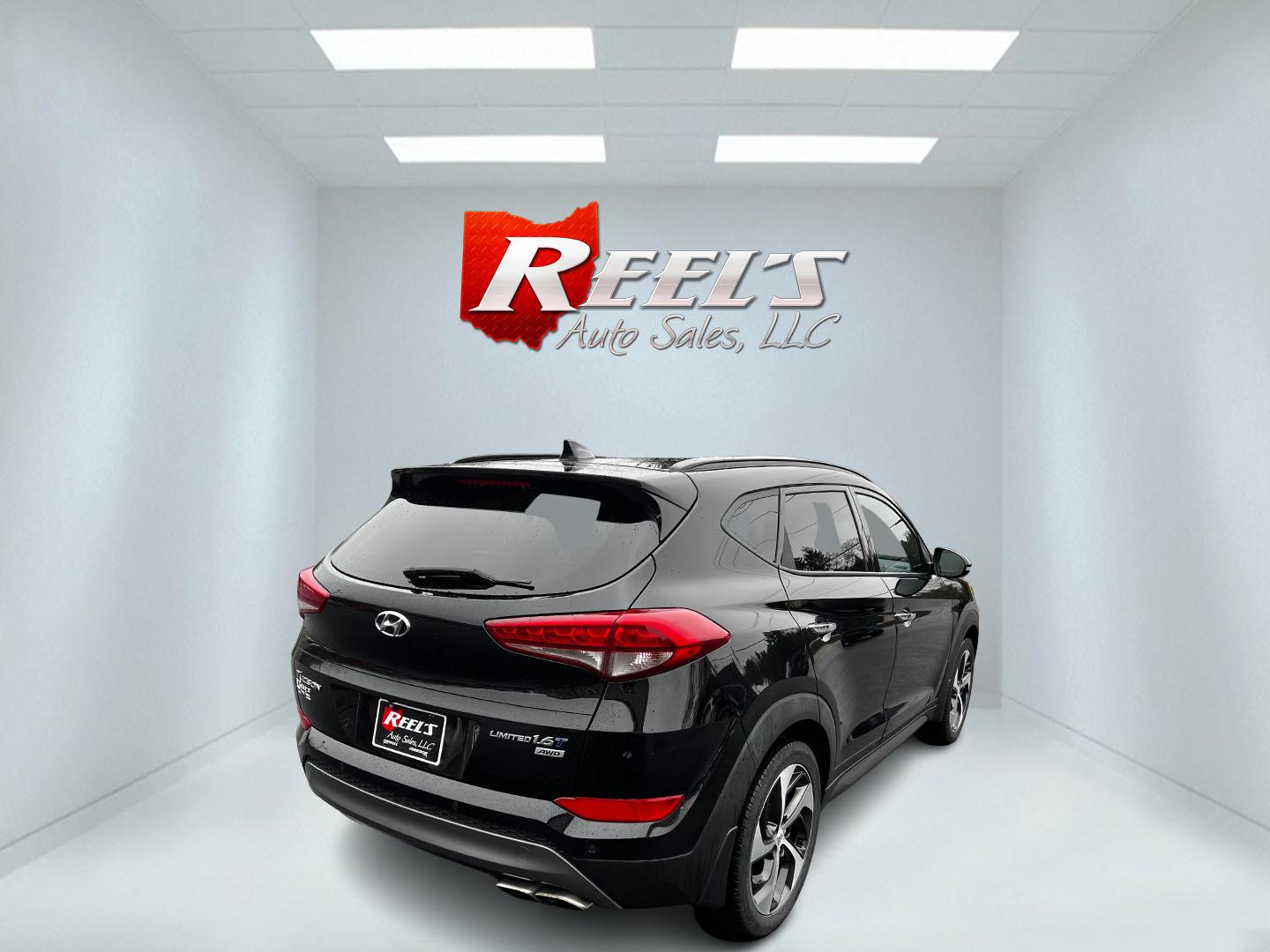 2016 Black /Black Hyundai Tucson Limited Ultimate AWD (KM8J3CA23GU) with an 1.6L I4 DOHC 16V TURBO engine, 7A transmission, located at 547 E. Main St., Orwell, OH, 44076, (440) 437-5893, 41.535435, -80.847855 - This One Owner 2016 Hyundai Tucson Limited Ultimate AWD is a compact SUV offering a blend of performance, luxury, and advanced technology. It features a 1.6-liter turbocharged I4 engine coupled with a 7-speed dual-clutch automatic transmission, providing a spirited driving experience. The interior b - Photo#5