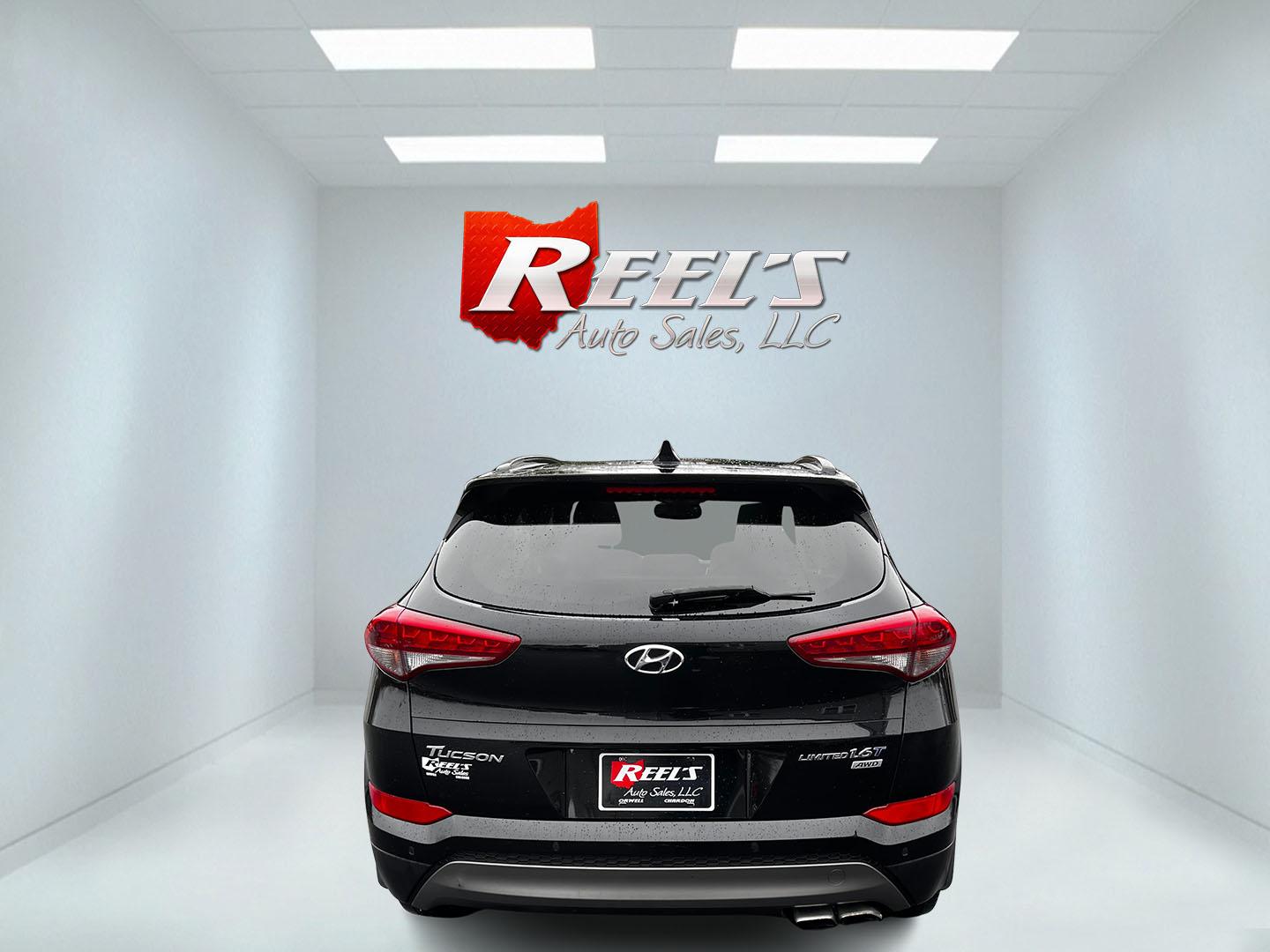 2016 Black /Black Hyundai Tucson Limited Ultimate AWD (KM8J3CA23GU) with an 1.6L I4 DOHC 16V TURBO engine, 7A transmission, located at 547 E. Main St., Orwell, OH, 44076, (440) 437-5893, 41.535435, -80.847855 - This One Owner 2016 Hyundai Tucson Limited Ultimate AWD is a compact SUV offering a blend of performance, luxury, and advanced technology. It features a 1.6-liter turbocharged I4 engine coupled with a 7-speed dual-clutch automatic transmission, providing a spirited driving experience. The interior b - Photo#6