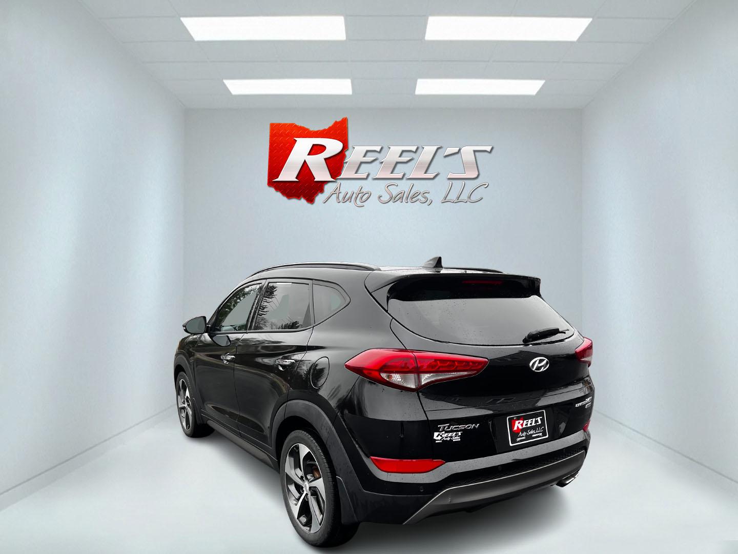 2016 Black /Black Hyundai Tucson Limited Ultimate AWD (KM8J3CA23GU) with an 1.6L I4 DOHC 16V TURBO engine, 7A transmission, located at 547 E. Main St., Orwell, OH, 44076, (440) 437-5893, 41.535435, -80.847855 - This One Owner 2016 Hyundai Tucson Limited Ultimate AWD is a compact SUV offering a blend of performance, luxury, and advanced technology. It features a 1.6-liter turbocharged I4 engine coupled with a 7-speed dual-clutch automatic transmission, providing a spirited driving experience. The interior b - Photo#7