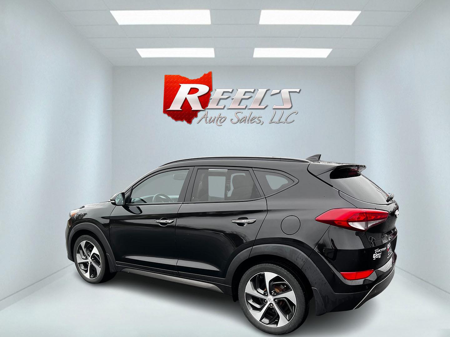 2016 Black /Black Hyundai Tucson Limited Ultimate AWD (KM8J3CA23GU) with an 1.6L I4 DOHC 16V TURBO engine, 7A transmission, located at 547 E. Main St., Orwell, OH, 44076, (440) 437-5893, 41.535435, -80.847855 - This One Owner 2016 Hyundai Tucson Limited Ultimate AWD is a compact SUV offering a blend of performance, luxury, and advanced technology. It features a 1.6-liter turbocharged I4 engine coupled with a 7-speed dual-clutch automatic transmission, providing a spirited driving experience. The interior b - Photo#8