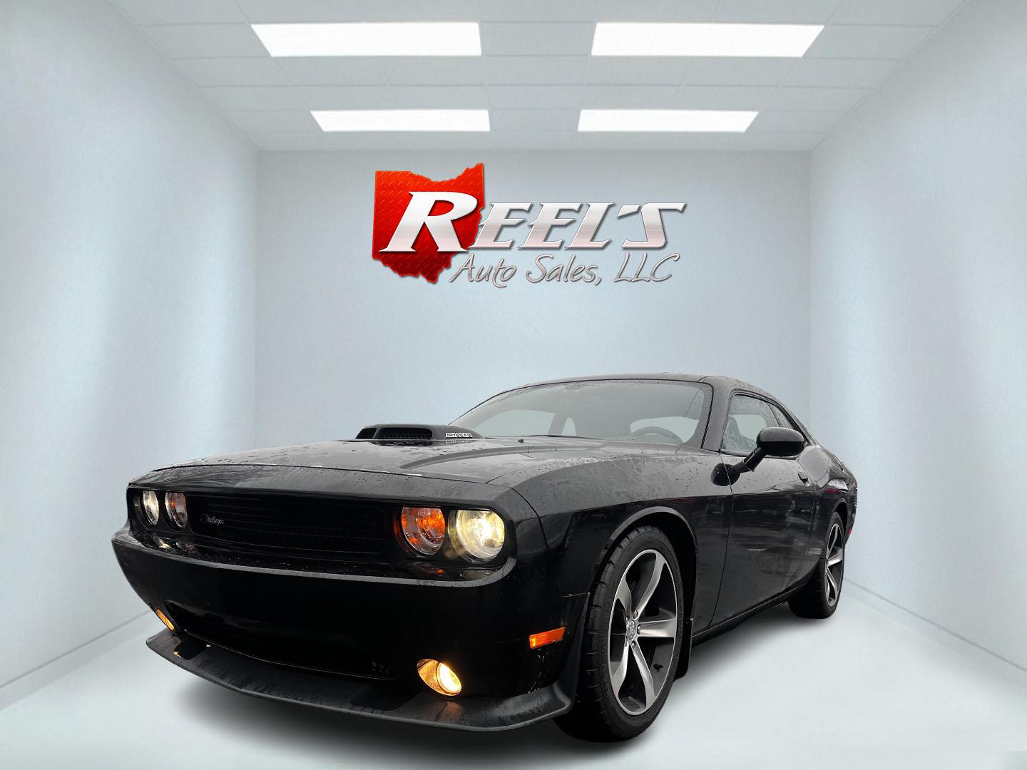 2014 Black /Black Dodge Challenger R/T Shacker (2C3CDYBT8EH) with an 5.7L V8 OHV 16V engine, 5 Speed Auto transmission, located at 11115 Chardon Rd. , Chardon, OH, 44024, (440) 214-9705, 41.580246, -81.241943 - This 2014 Dodge Challenger R/T Shaker is a rare, powerful and, stylish muscle car featuring a robust 5.7-liter HEMI V8 engine paired with a 5-speed automatic transmission. It delivers impressive performance with 372 horsepower and 400 lb-ft of torque, achieving 0-60 mph in about 5.5 seconds. This ve - Photo#0