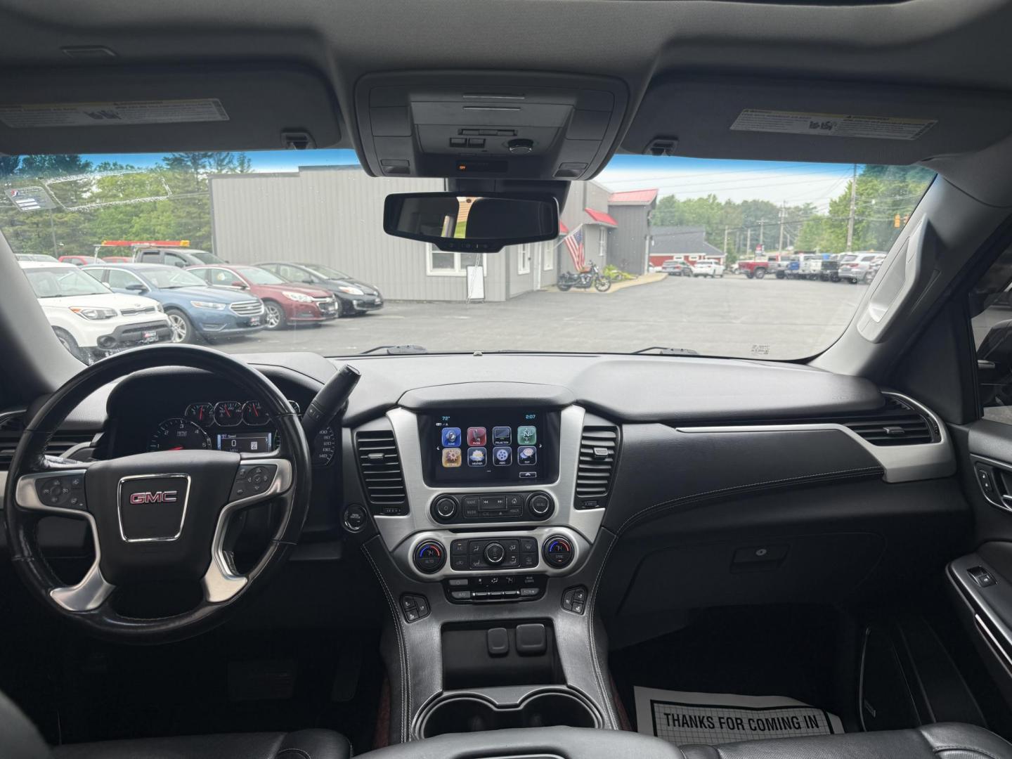 2018 Black /Black GMC Yukon SLT 4WD (1GKS2BKC4JR) with an 5.3L V8 OHV 16V engine, 6A transmission, located at 11115 Chardon Rd. , Chardon, OH, 44024, (440) 214-9705, 41.580246, -81.241943 - This 2018 GMC Yukon SLT 4WD is a full-size SUV that features a powerful 5.3-liter Vortec V8 engine and a 6-speed automatic transmission, boasting a towing capacity of 6,200 pounds, making it suitable for hauling and family adventures. Its luxurious interior includes leather seating with both heated - Photo#15
