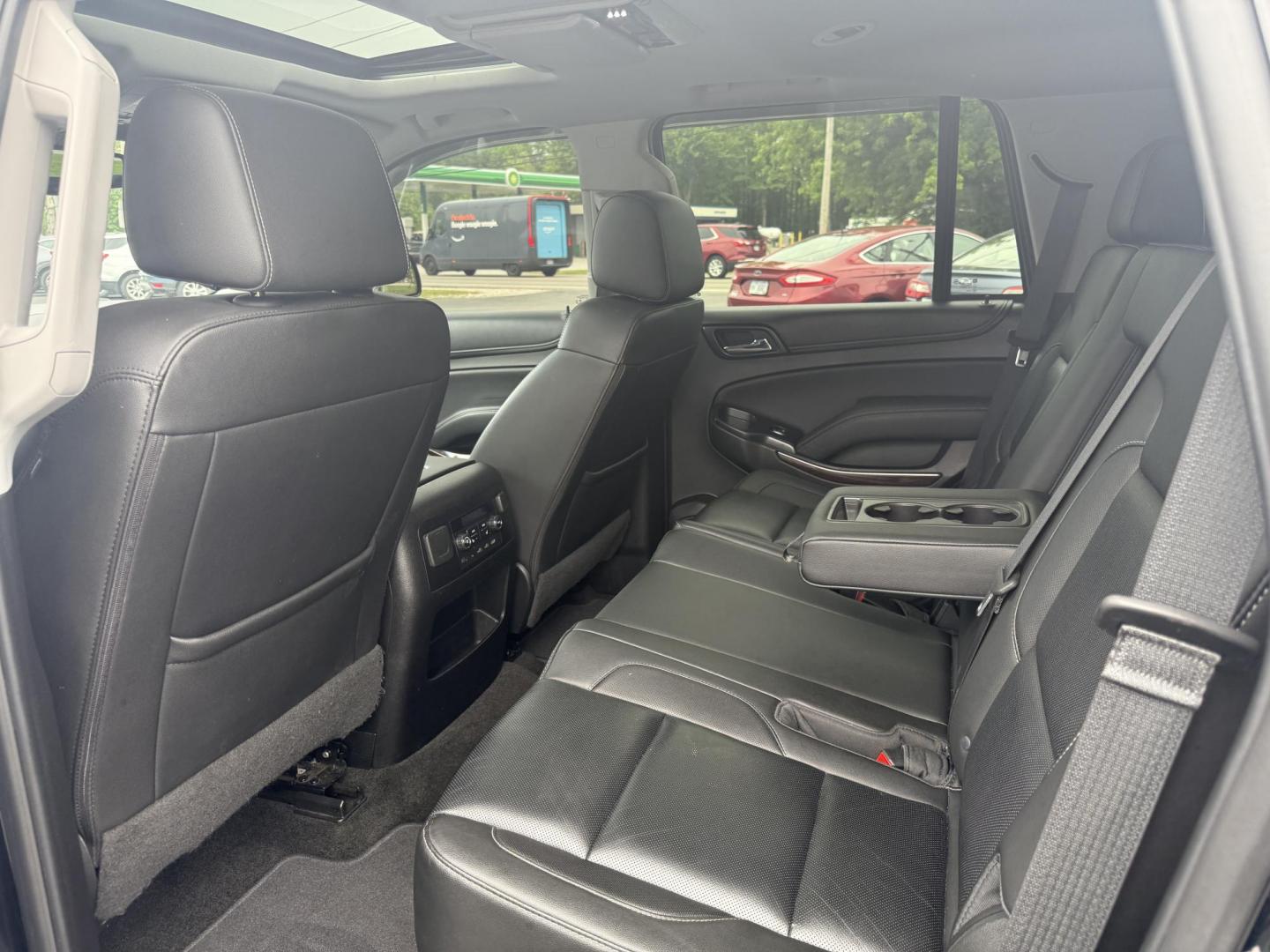 2018 Black /Black GMC Yukon SLT 4WD (1GKS2BKC4JR) with an 5.3L V8 OHV 16V engine, 6A transmission, located at 11115 Chardon Rd. , Chardon, OH, 44024, (440) 214-9705, 41.580246, -81.241943 - This 2018 GMC Yukon SLT 4WD is a full-size SUV that features a powerful 5.3-liter Vortec V8 engine and a 6-speed automatic transmission, boasting a towing capacity of 6,200 pounds, making it suitable for hauling and family adventures. Its luxurious interior includes leather seating with both heated - Photo#33