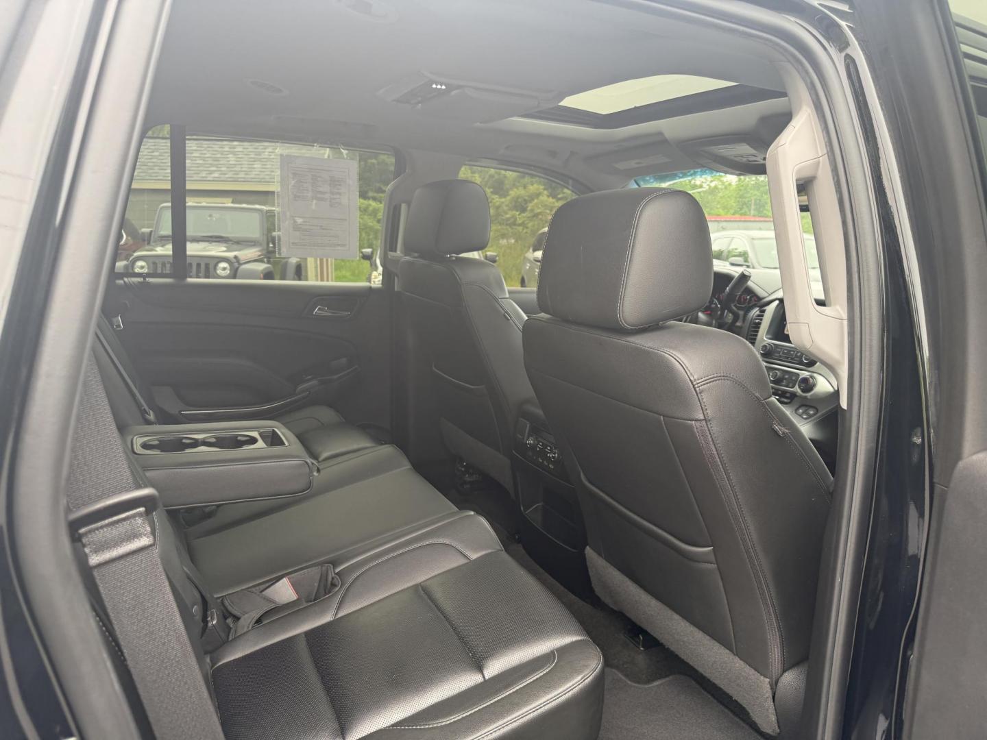 2018 Black /Black GMC Yukon SLT 4WD (1GKS2BKC4JR) with an 5.3L V8 OHV 16V engine, 6A transmission, located at 11115 Chardon Rd. , Chardon, OH, 44024, (440) 214-9705, 41.580246, -81.241943 - This 2018 GMC Yukon SLT 4WD is a full-size SUV that features a powerful 5.3-liter Vortec V8 engine and a 6-speed automatic transmission, boasting a towing capacity of 6,200 pounds, making it suitable for hauling and family adventures. Its luxurious interior includes leather seating with both heated - Photo#38