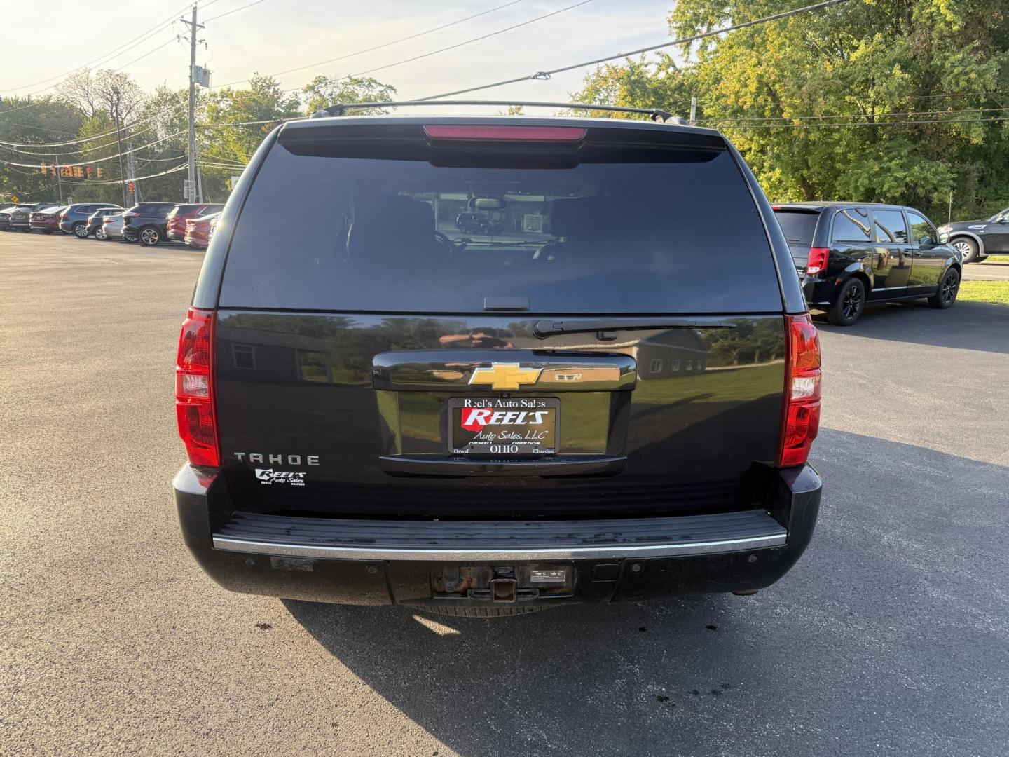 2013 Black /Black Chevrolet Tahoe LTZ 4WD (1GNSKCE02DR) with an 5.3L V8 OHV 16V FFV engine, 6-Speed Automatic transmission, located at 11115 Chardon Rd. , Chardon, OH, 44024, (440) 214-9705, 41.580246, -81.241943 - This 2013 Chevrolet Tahoe LTZ 4WD is a full-size SUV equipped with a 5.3-liter Vortec V8 engine and a 6-speed automatic transmission, as well as 3.42 gearing, which contributes to its impressive 8,200-pound towing capacity. Its interior is designed with luxury and comfort in mind, featuring leather - Photo#8