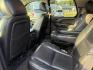 2013 Black /Black Chevrolet Tahoe LTZ 4WD (1GNSKCE02DR) with an 5.3L V8 OHV 16V FFV engine, 6-Speed Automatic transmission, located at 11115 Chardon Rd. , Chardon, OH, 44024, (440) 214-9705, 41.580246, -81.241943 - This 2013 Chevrolet Tahoe LTZ 4WD is a full-size SUV equipped with a 5.3-liter Vortec V8 engine and a 6-speed automatic transmission, as well as 3.42 gearing, which contributes to its impressive 8,200-pound towing capacity. Its interior is designed with luxury and comfort in mind, featuring leather - Photo#32