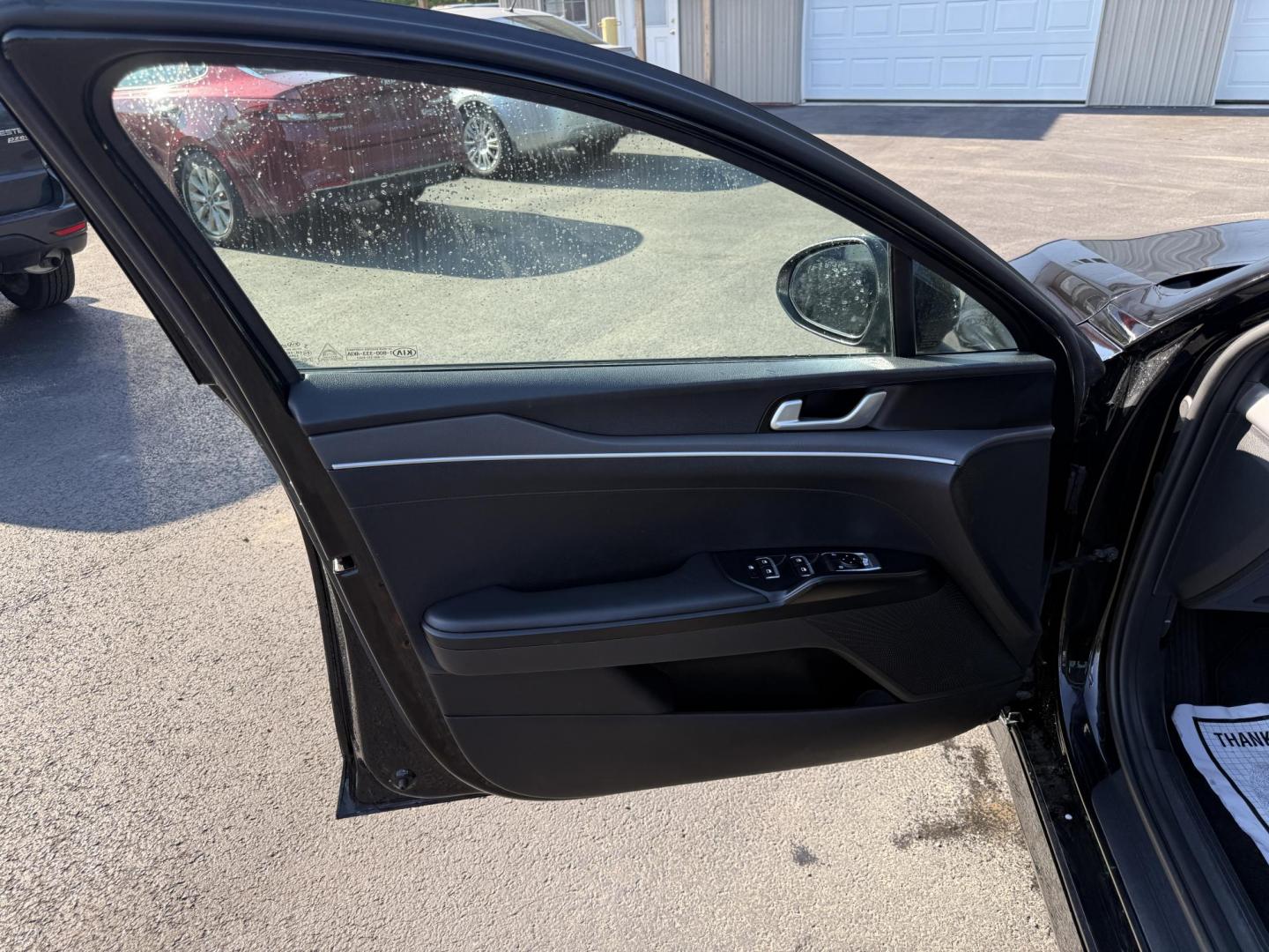 2021 Black /Black Kia K5 LXS (5XXG14J2XMG) with an 1.6L I4 DOHC 16V TURBO engine, 8-Speed Automatic transmission, located at 547 E. Main St., Orwell, OH, 44076, (440) 437-5893, 41.535435, -80.847855 - This 2021 Kia K5 LXS is a midsize sedan that combines style with a range of advanced features. It is powered by a 1.6-liter Turbocharged Inline-4 GDI engine paired with an 8-speed automatic transmission, delivering impressive fuel efficiency of 37 MPG on the highway. This vehicle comes equipped with - Photo#25