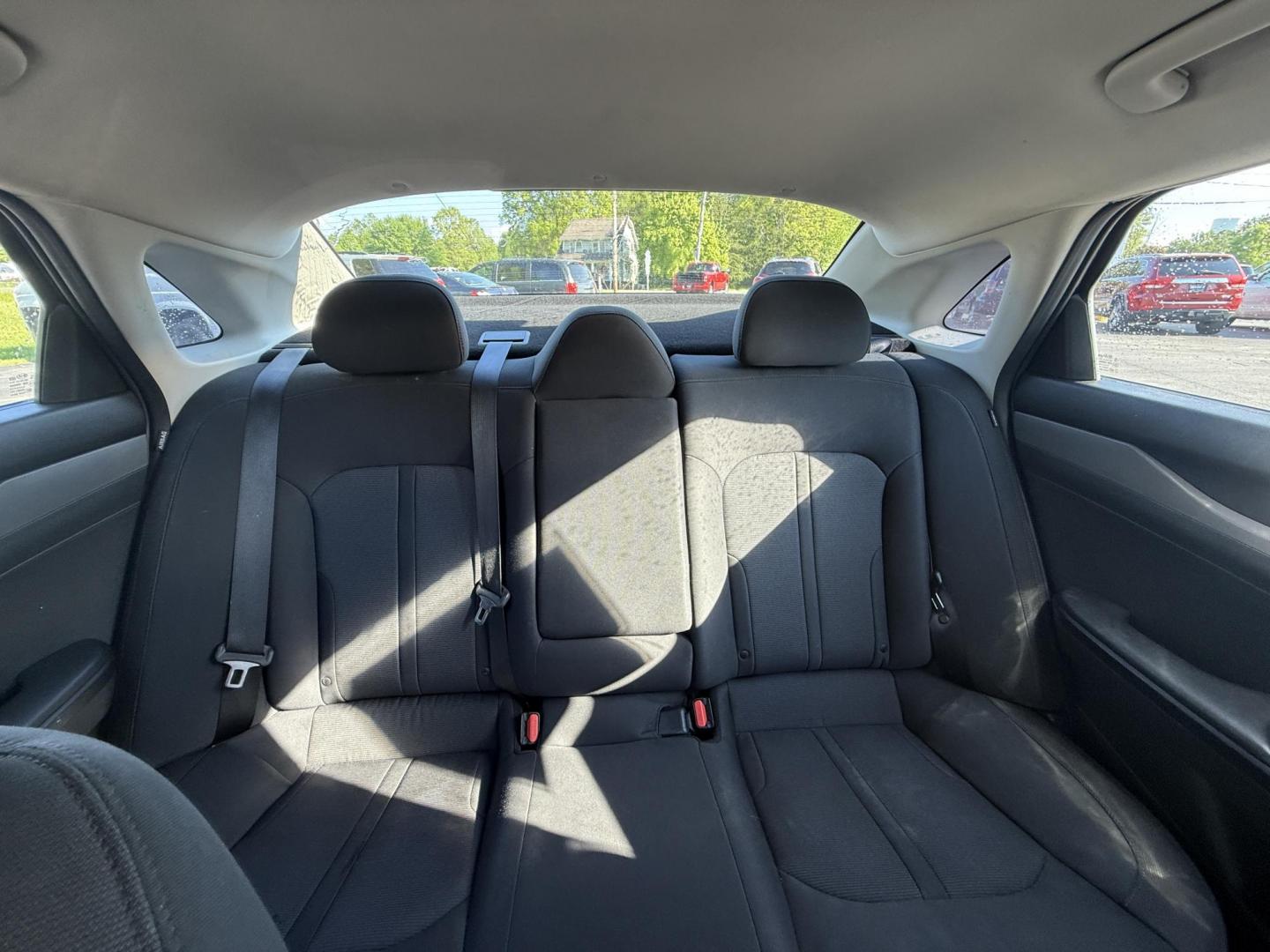 2021 Black /Black Kia K5 LXS (5XXG14J2XMG) with an 1.6L I4 DOHC 16V TURBO engine, 8-Speed Automatic transmission, located at 547 E. Main St., Orwell, OH, 44076, (440) 437-5893, 41.535435, -80.847855 - This 2021 Kia K5 LXS is a midsize sedan that combines style with a range of advanced features. It is powered by a 1.6-liter Turbocharged Inline-4 GDI engine paired with an 8-speed automatic transmission, delivering impressive fuel efficiency of 37 MPG on the highway. This vehicle comes equipped with - Photo#11