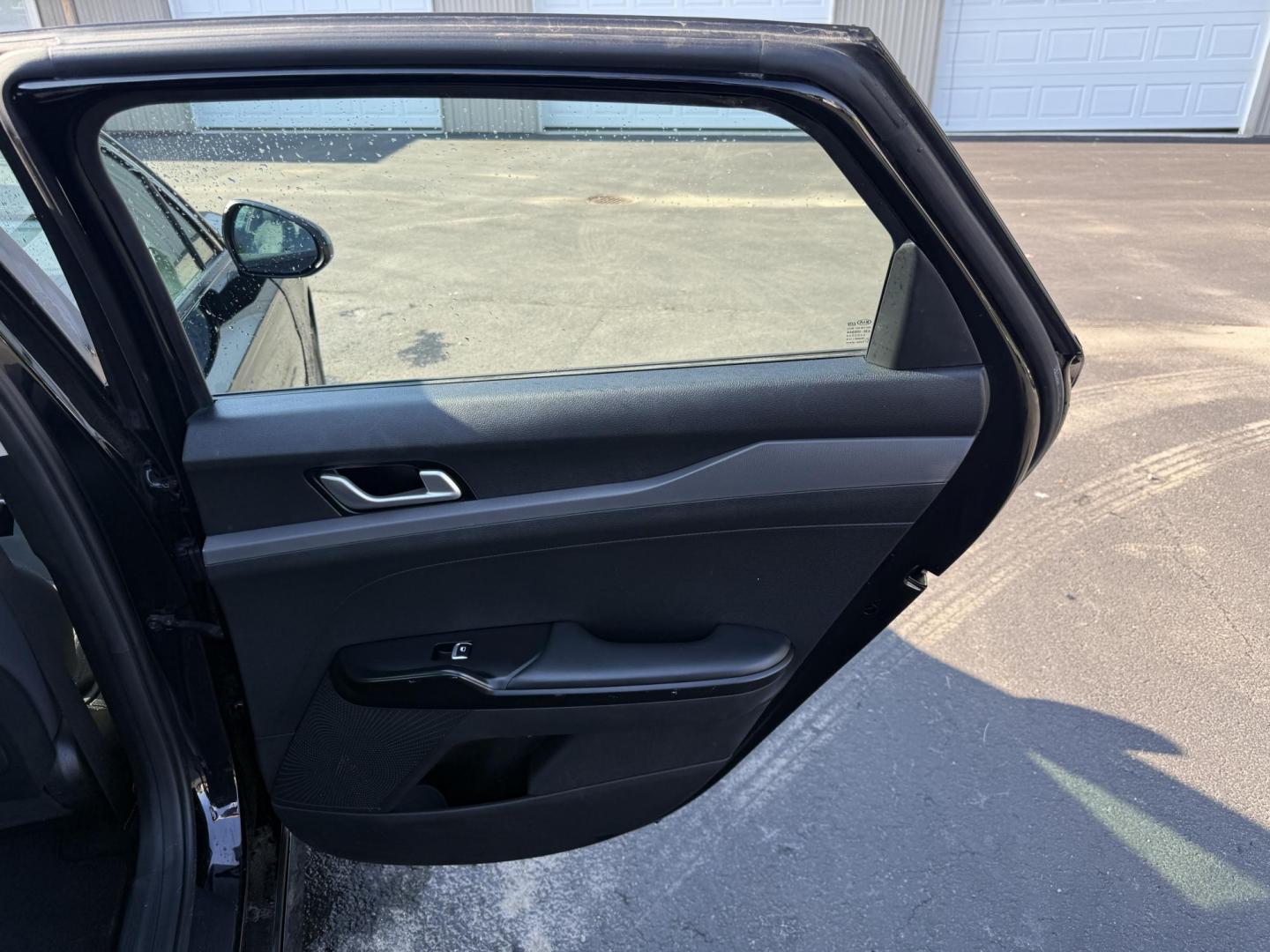 2021 Black /Black Kia K5 LXS (5XXG14J2XMG) with an 1.6L I4 DOHC 16V TURBO engine, 8-Speed Automatic transmission, located at 547 E. Main St., Orwell, OH, 44076, (440) 437-5893, 41.535435, -80.847855 - This 2021 Kia K5 LXS is a midsize sedan that combines style with a range of advanced features. It is powered by a 1.6-liter Turbocharged Inline-4 GDI engine paired with an 8-speed automatic transmission, delivering impressive fuel efficiency of 37 MPG on the highway. This vehicle comes equipped with - Photo#34