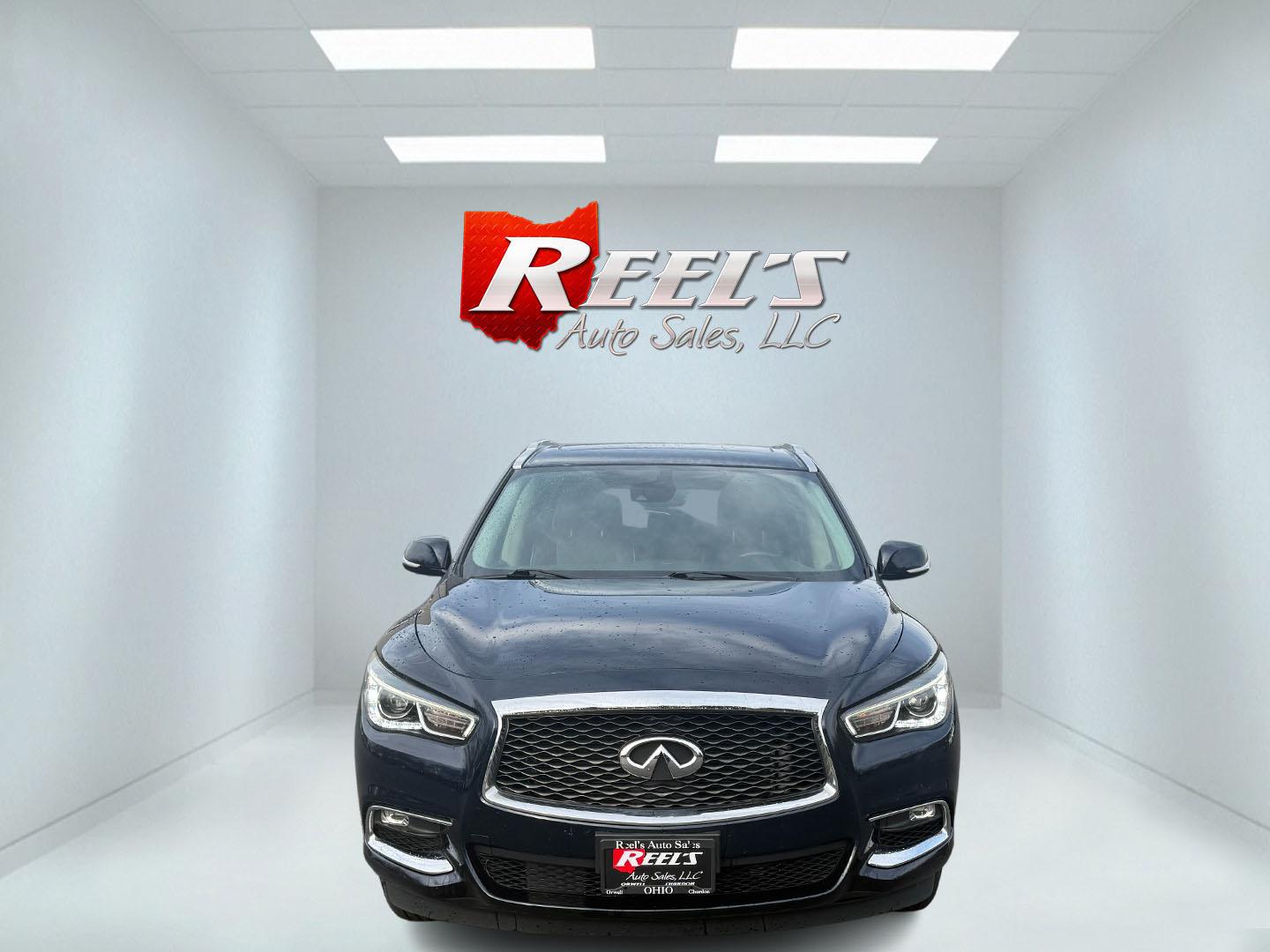 2020 Blue /Black Infiniti QX60 Luxe AWD (5N1DL0MM8LC) with an 3.5L V6 DOHC 24V engine, Automatic transmission, located at 11115 Chardon Rd. , Chardon, OH, 44024, (440) 214-9705, 41.580246, -81.241943 - This 2020 Infiniti QX60 Luxe AWD is a sophisticated SUV powered by a 3.5L V6 engine, providing a towing capacity of up to 5,000 pounds. It boasts a refined leather interior with power and heated front seats for added comfort, complemented by LED headlights and a power sunroof for an elevated driving - Photo#1